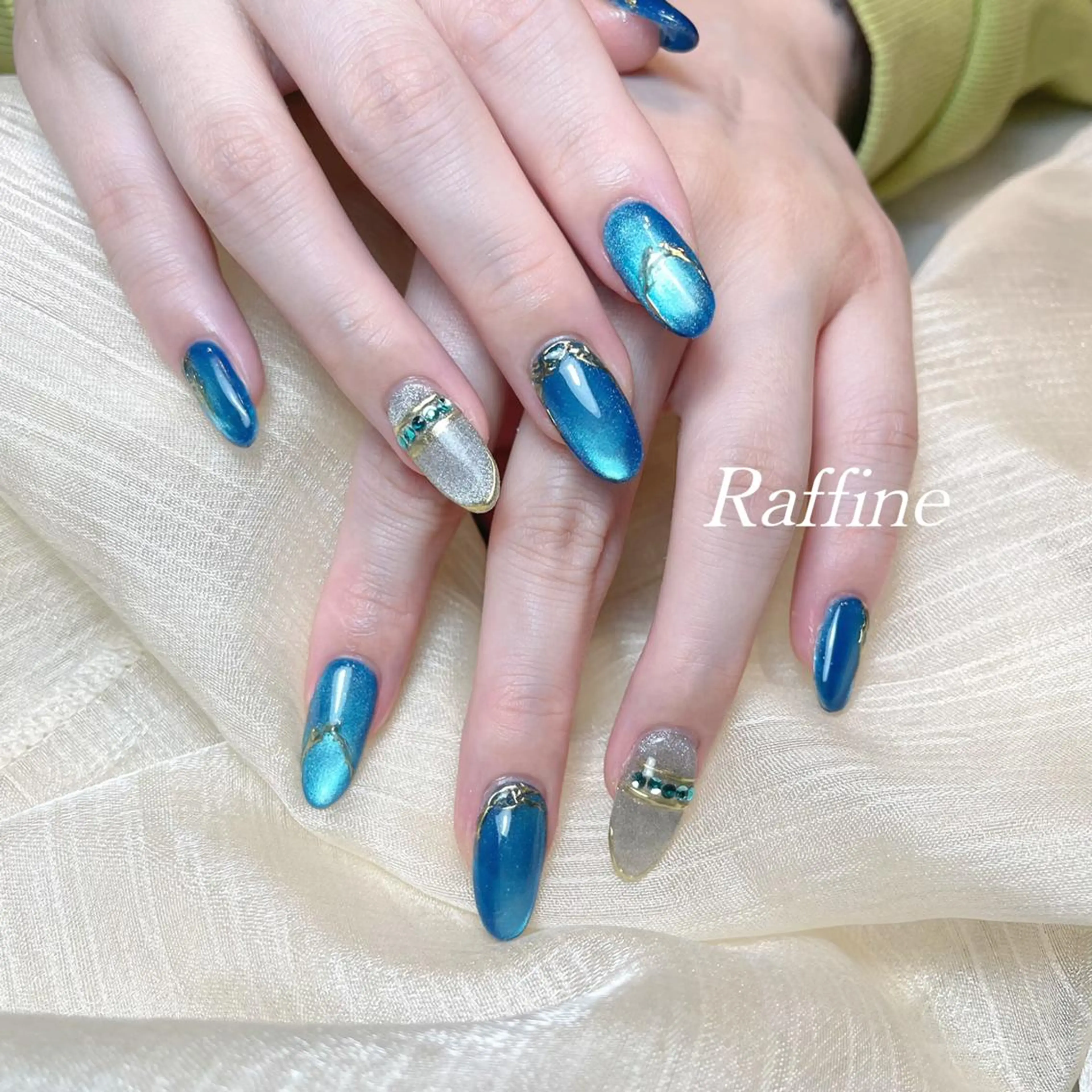 ネイル RAFFINE 月🦋🩵のネイルデザイン