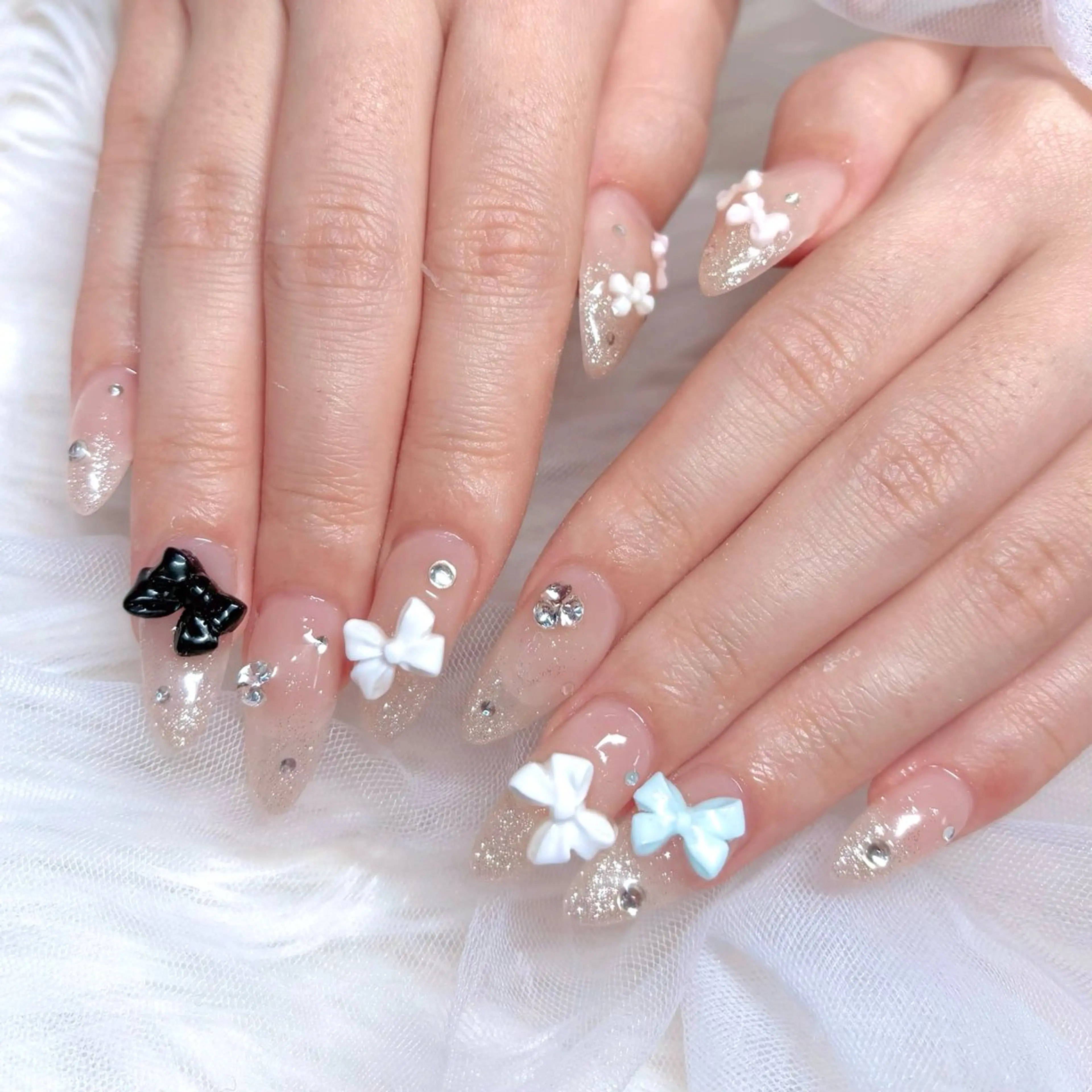 ネイル アートネイル キラキラネイル リボン ハンドネイル Noix nailのネイルデザイン