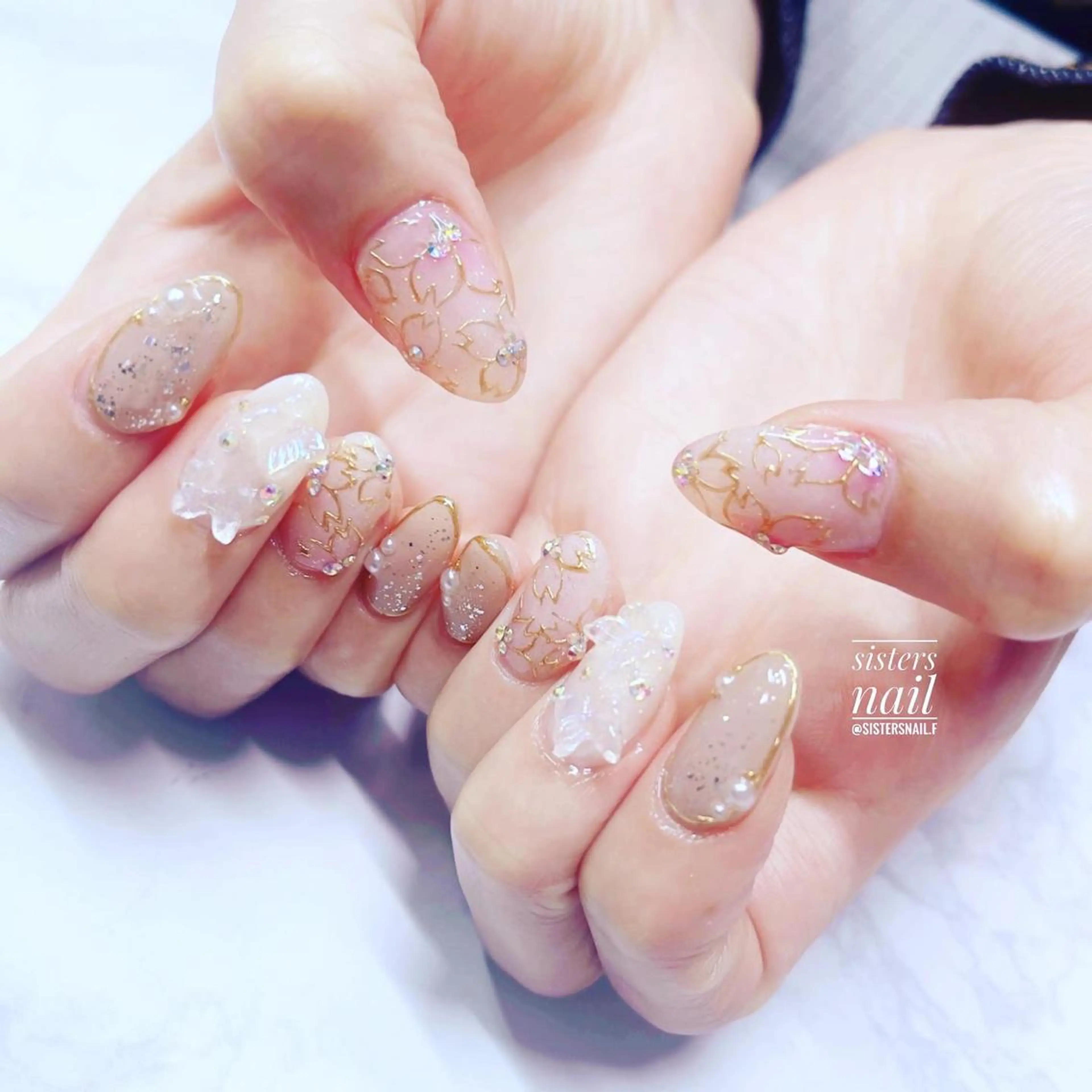 ネイル アートネイル 桜ネイル フラワーネイル ラメ(グリッター) ミラーネイル sisters nail.fのネイルデザイン