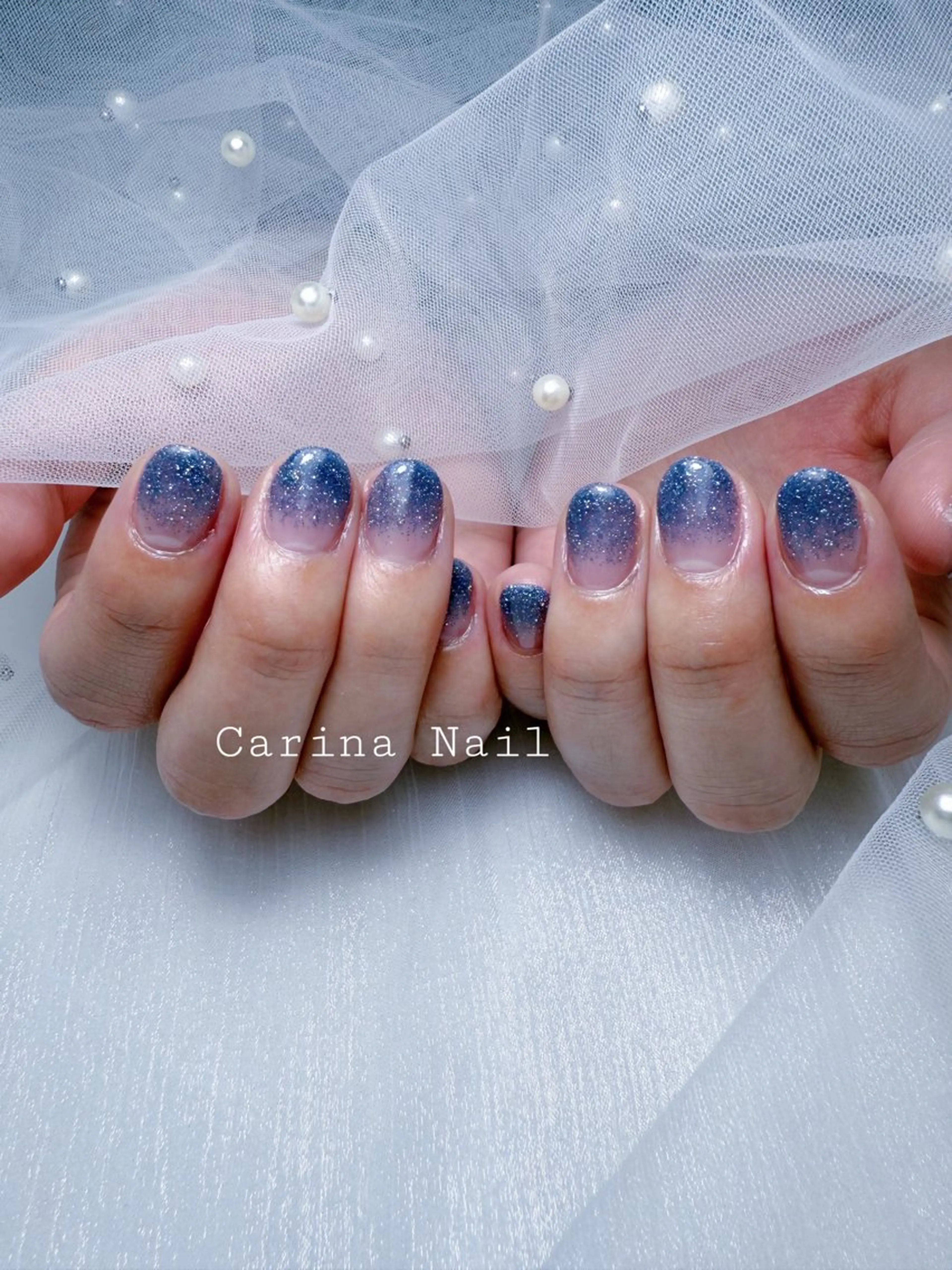 ネイル ブルー グラデーション ラメ(グリッター) ラメグラデーション シンプルネイル Carina Nail所属・Carina Nailのネイルデザイン