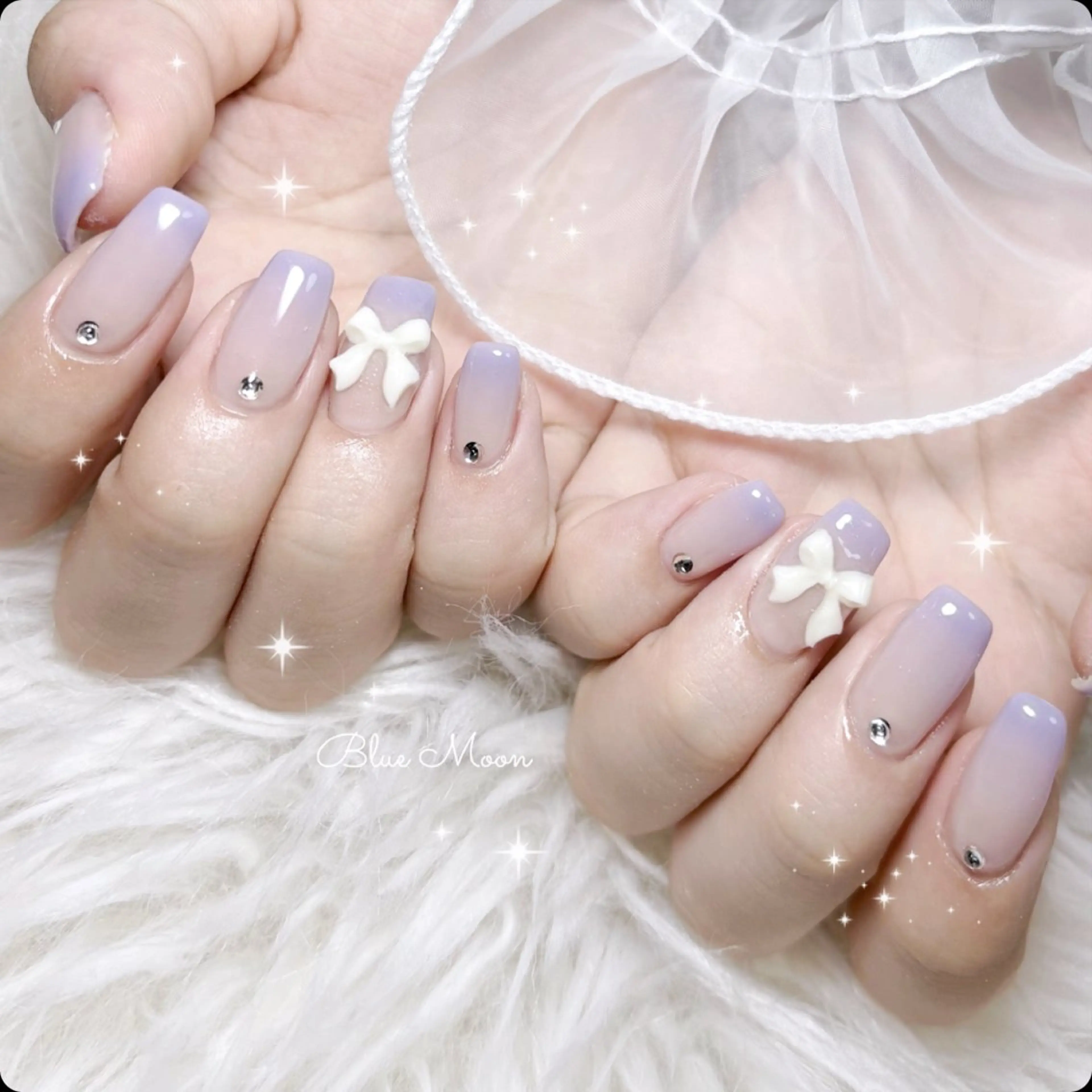 ネイル リボン ストーンネイル ハンドネイル ハンドケア nail salon Blue Moonのネイルデザイン