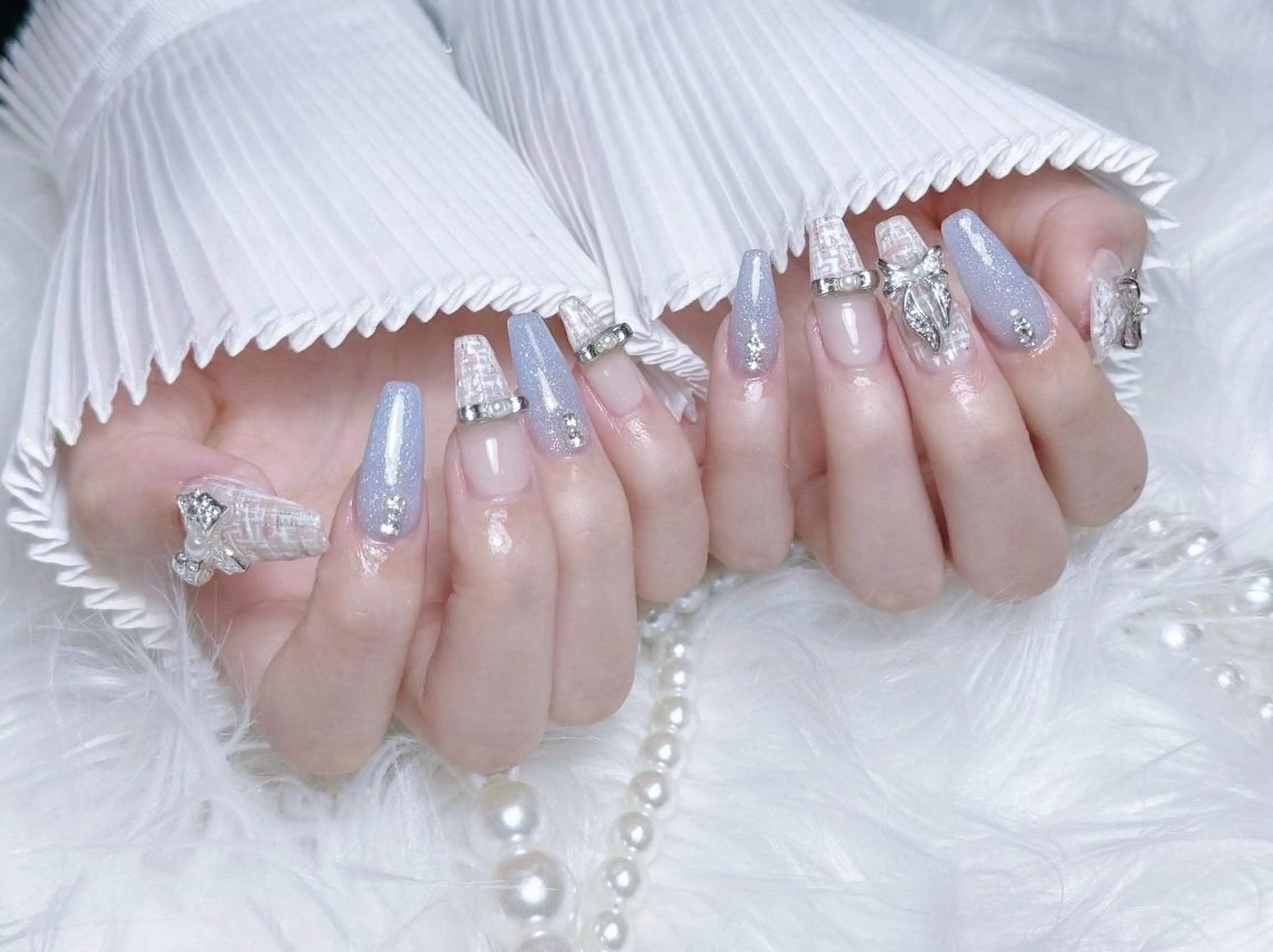 ネイル RAFFINE 月🦋🩵のネイルデザイン