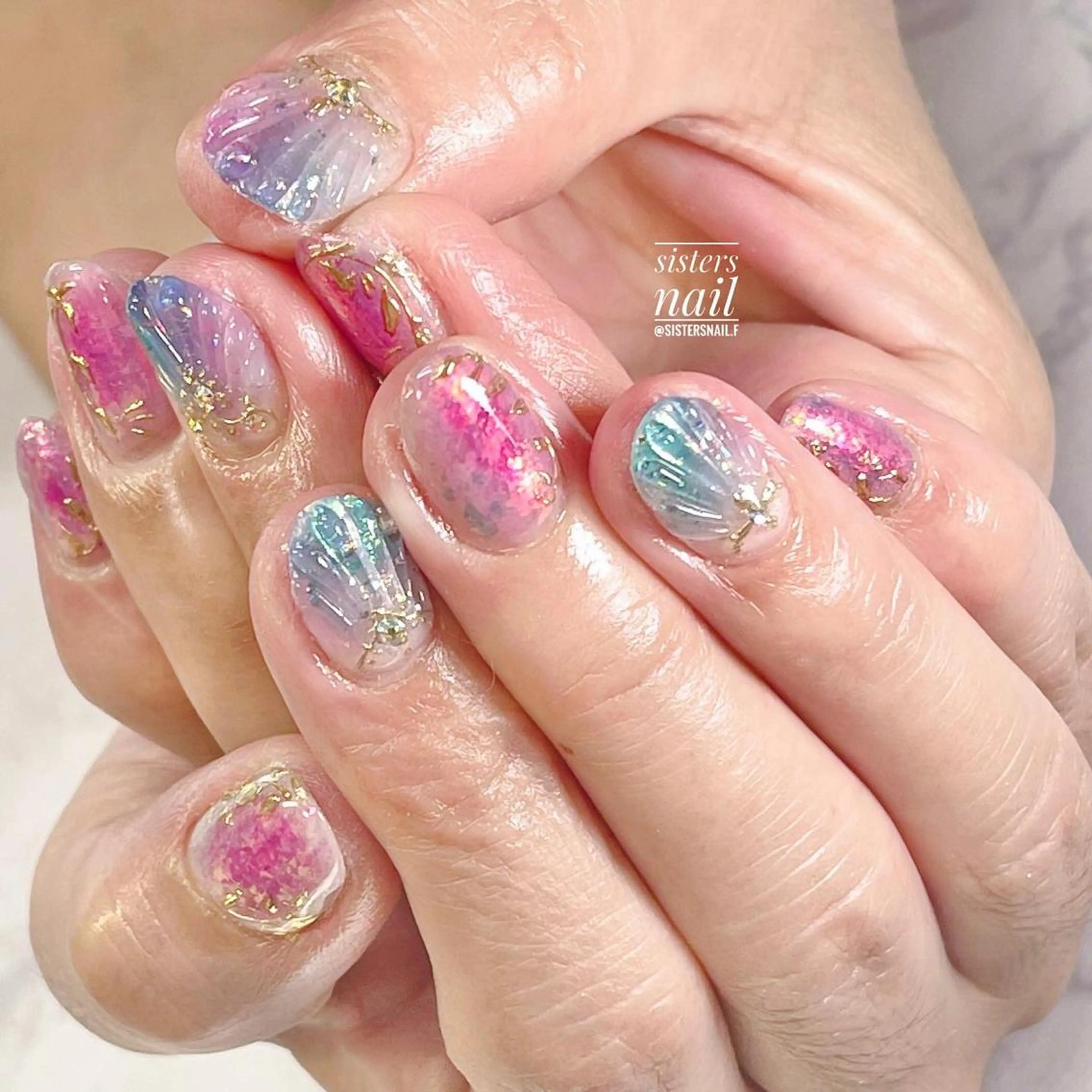 ネイル アートネイル オーロラネイル クリアネイル ジェルネイル ゴールド sisters nail.fのネイルデザイン