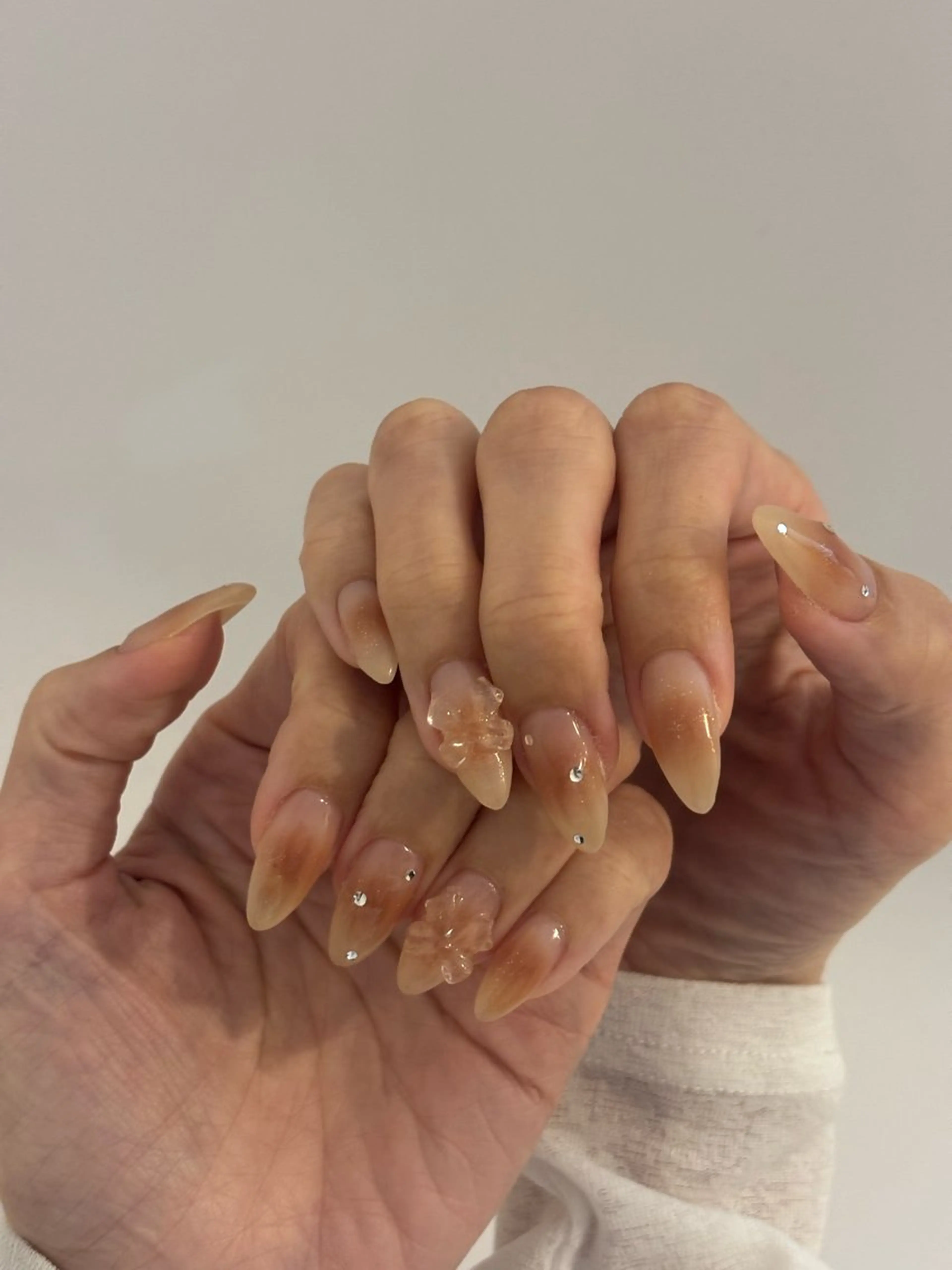 ネイル チークネイル クリアネイル リボン ハンドネイル Elio所属・Elio 国泰寺のネイルデザイン