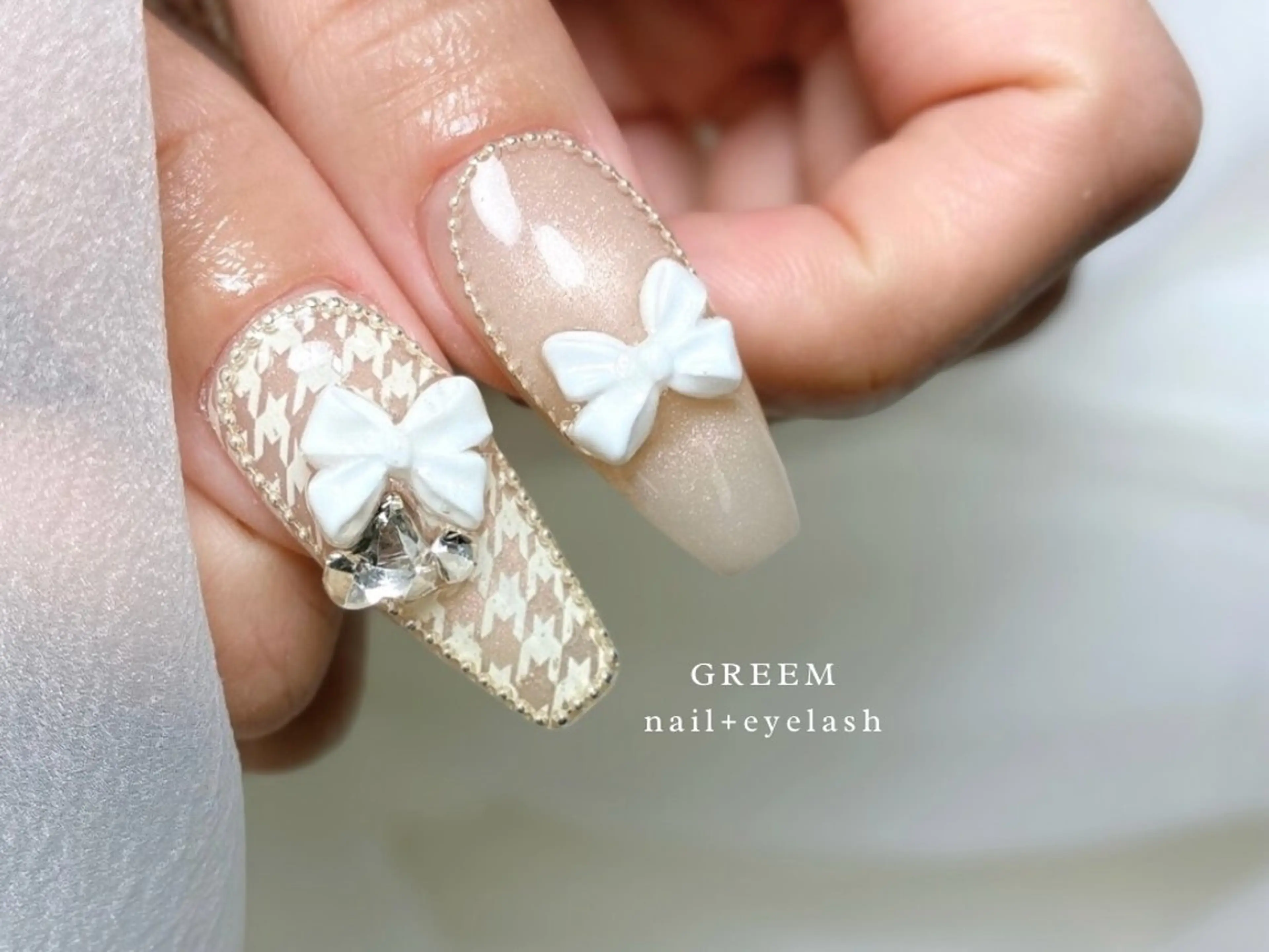 ネイル リボン ホワイト 冬ネイル ハンドネイル GREEM グリームのネイルデザイン