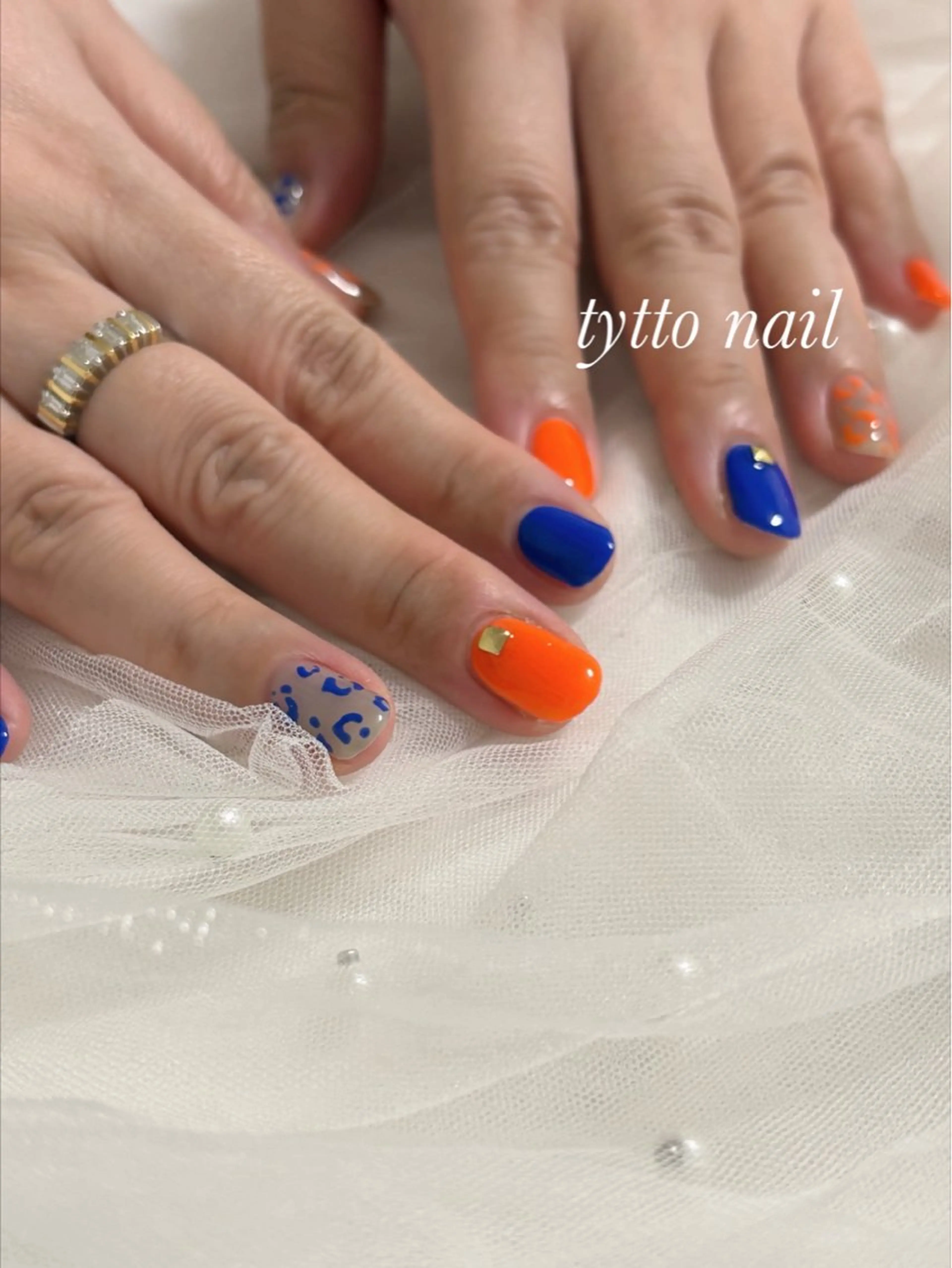 ネイル アニマル柄 ブルー オフィスネイル ワンカラーネイル オレンジ ハンドネイル tytto nail ❤︎‪‪eri‪‪のネイルデザイン