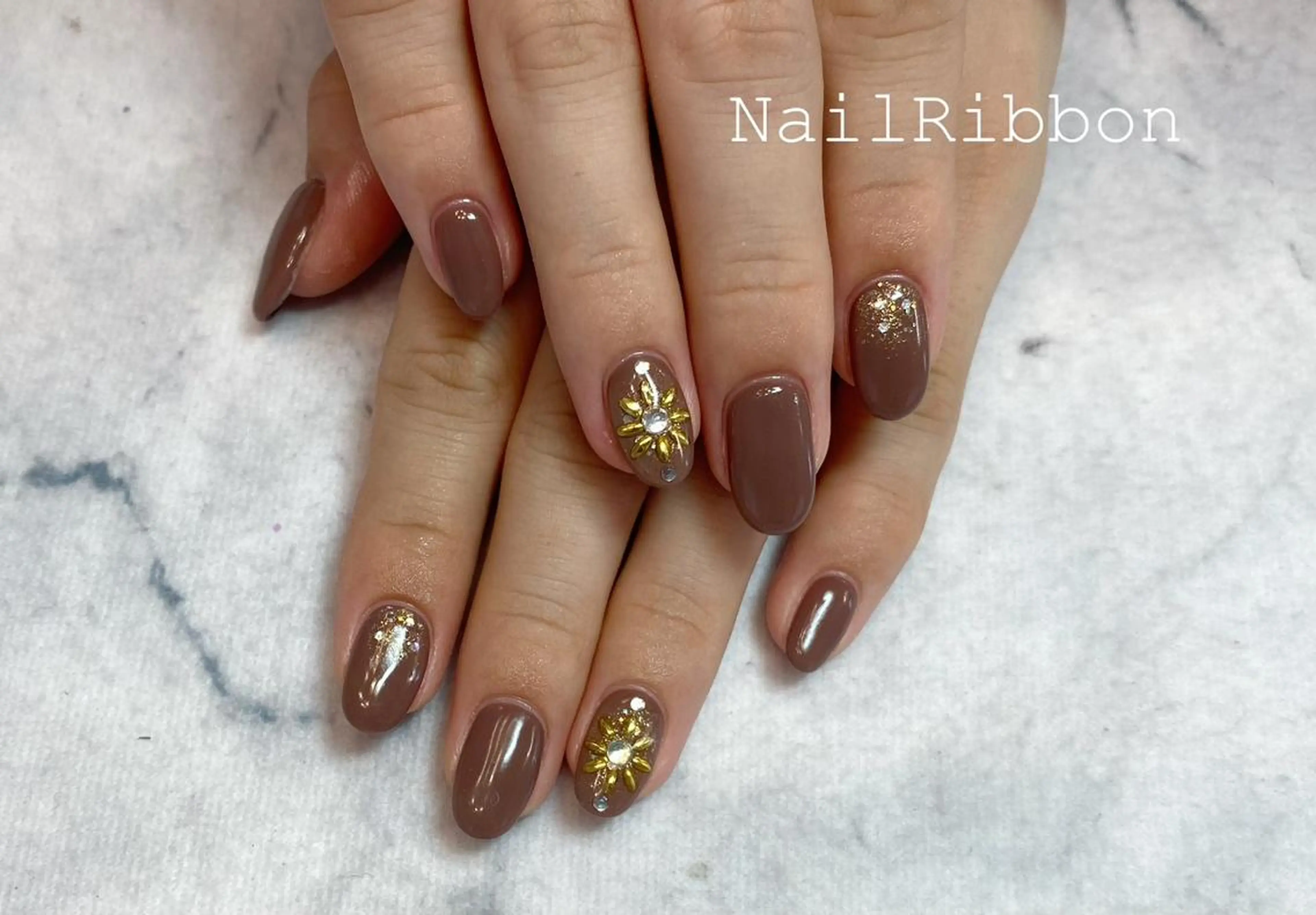 ネイル ネイルリボン 受付スタッフのネイルデザイン