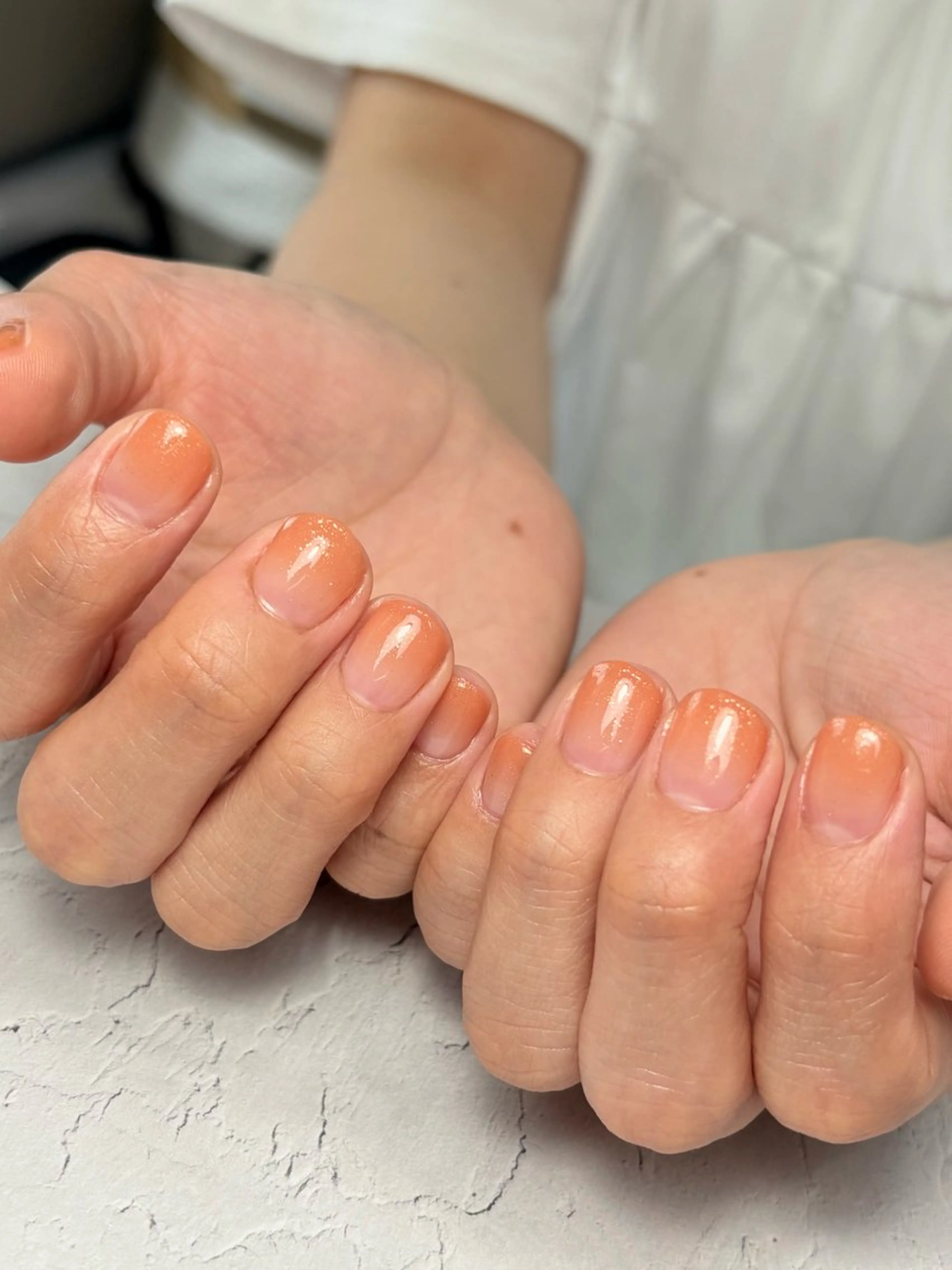ネイル グラデーション ラメ(グリッター) オフィスネイル ワンカラーネイル オレンジ Natuleaナチュリア所属・深爪矯正自爪育成専門 natuleaのネイルデザイン