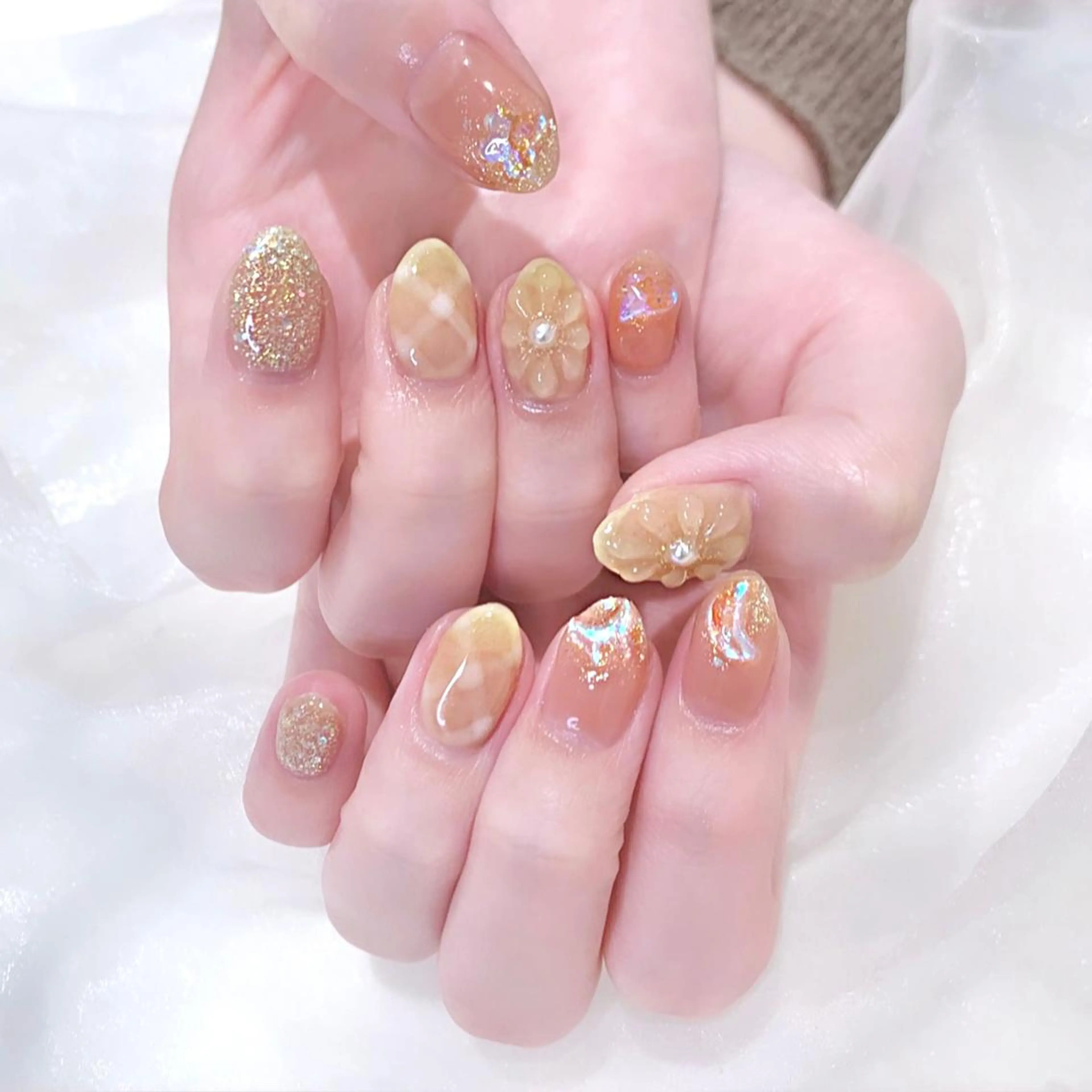 ネイル 氷ネイル・うるうるネイル オレンジ 黄色 ハンドネイル Kanon 🤍のネイルデザイン