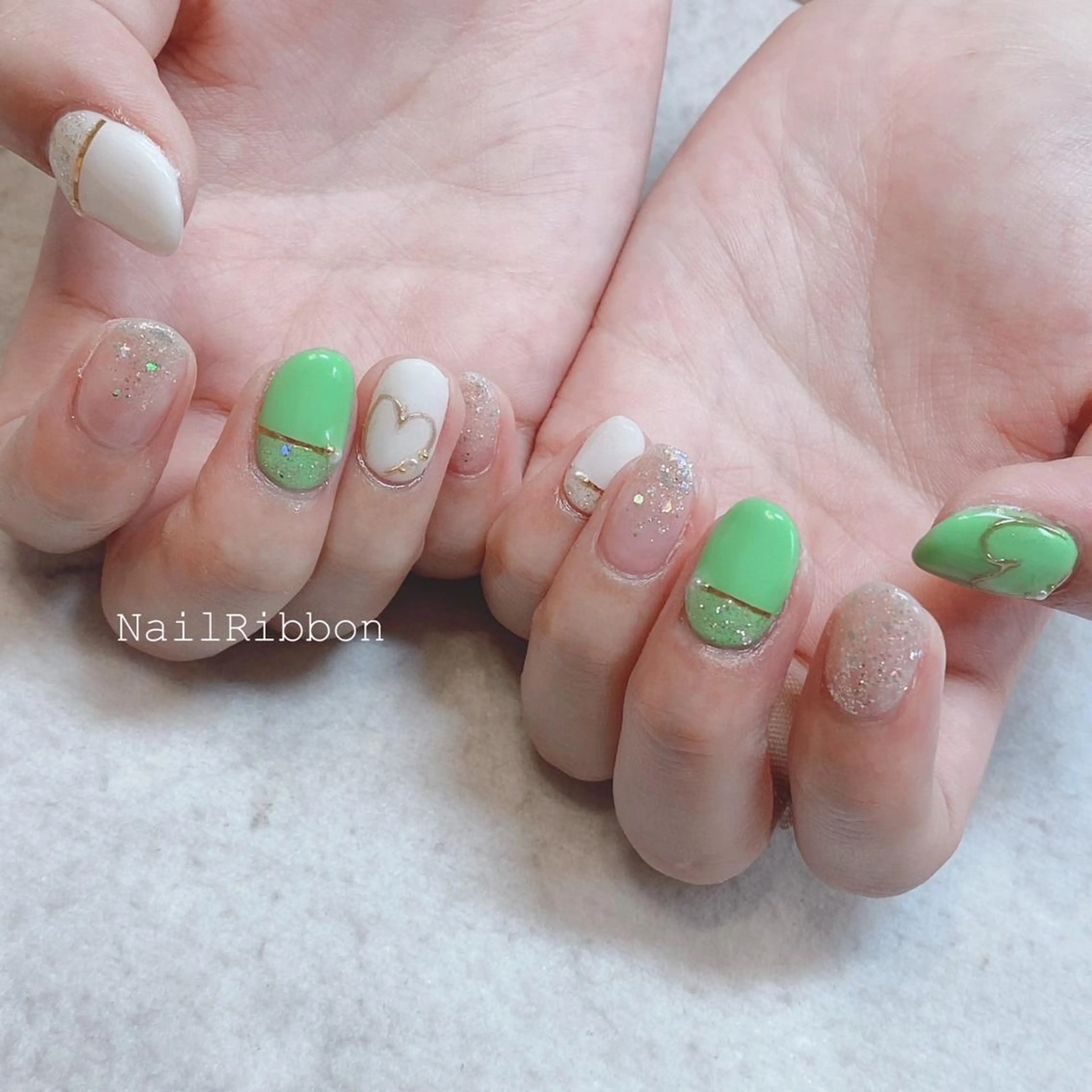 ネイル ネイルリボン 受付スタッフのネイルデザイン