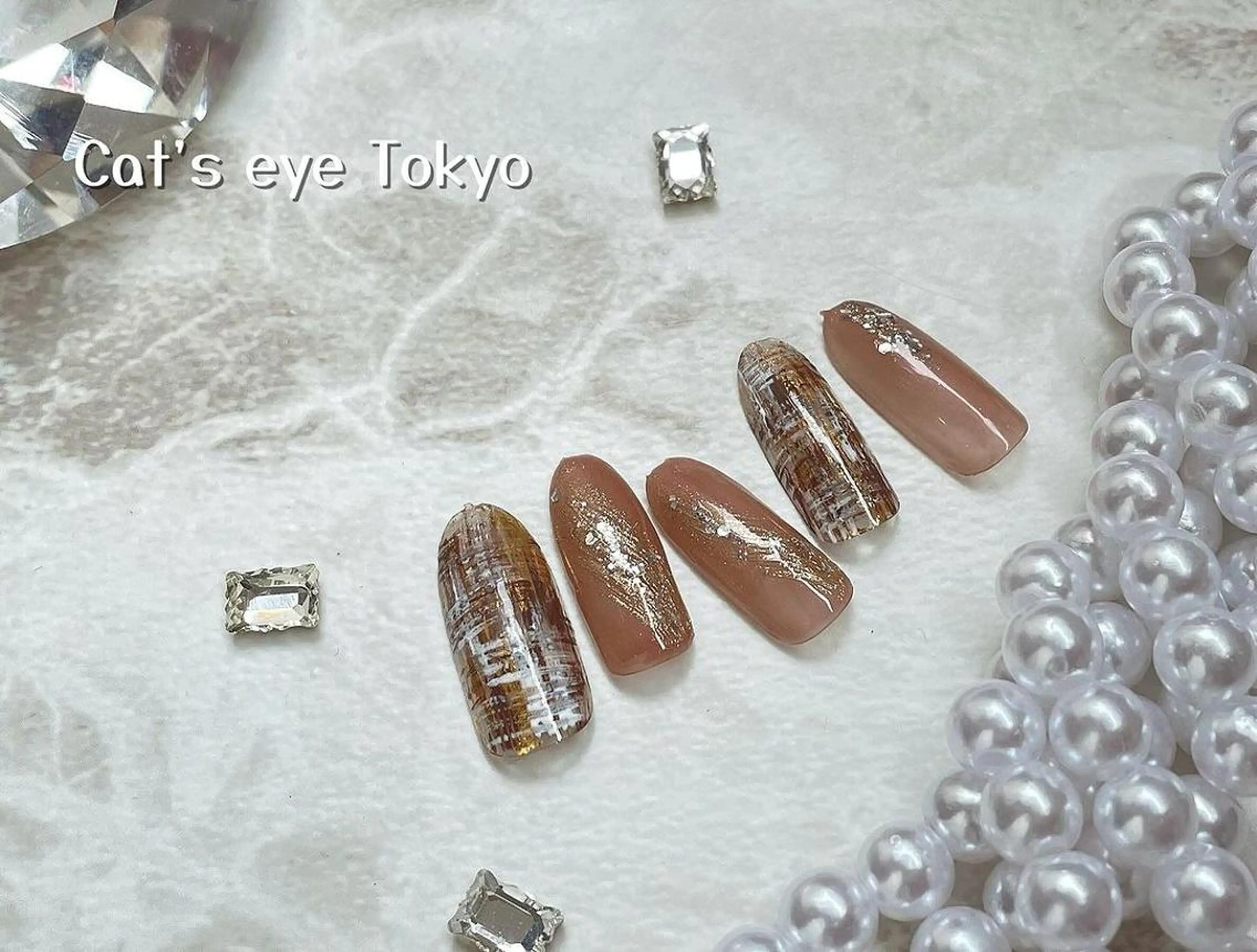 ネイル アートネイル べっ甲ネイル ジェルネイル マグネットネイル ミラーネイル Cat's eye TOKYO 新宿店のネイルデザイン