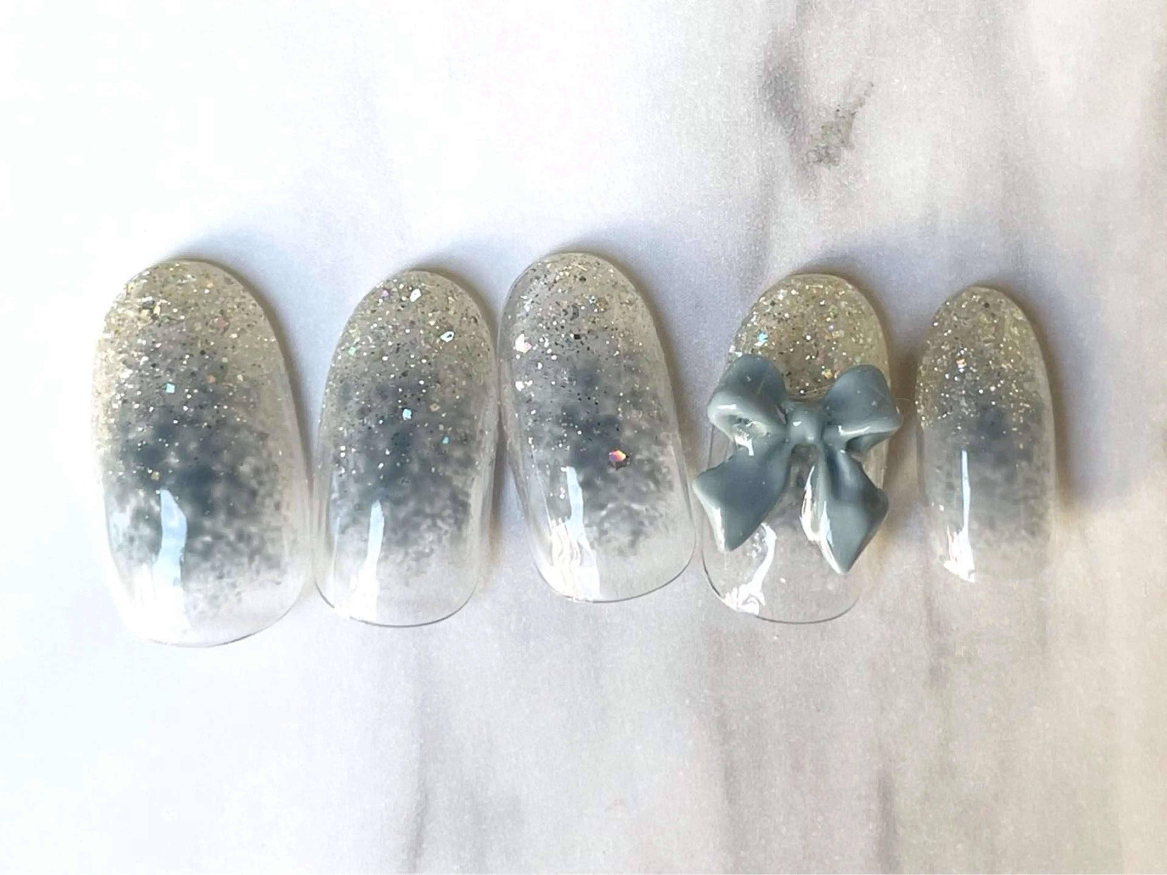 ロング ハンドネイル プティリボン 武蔵小金井店のネイルデザイン