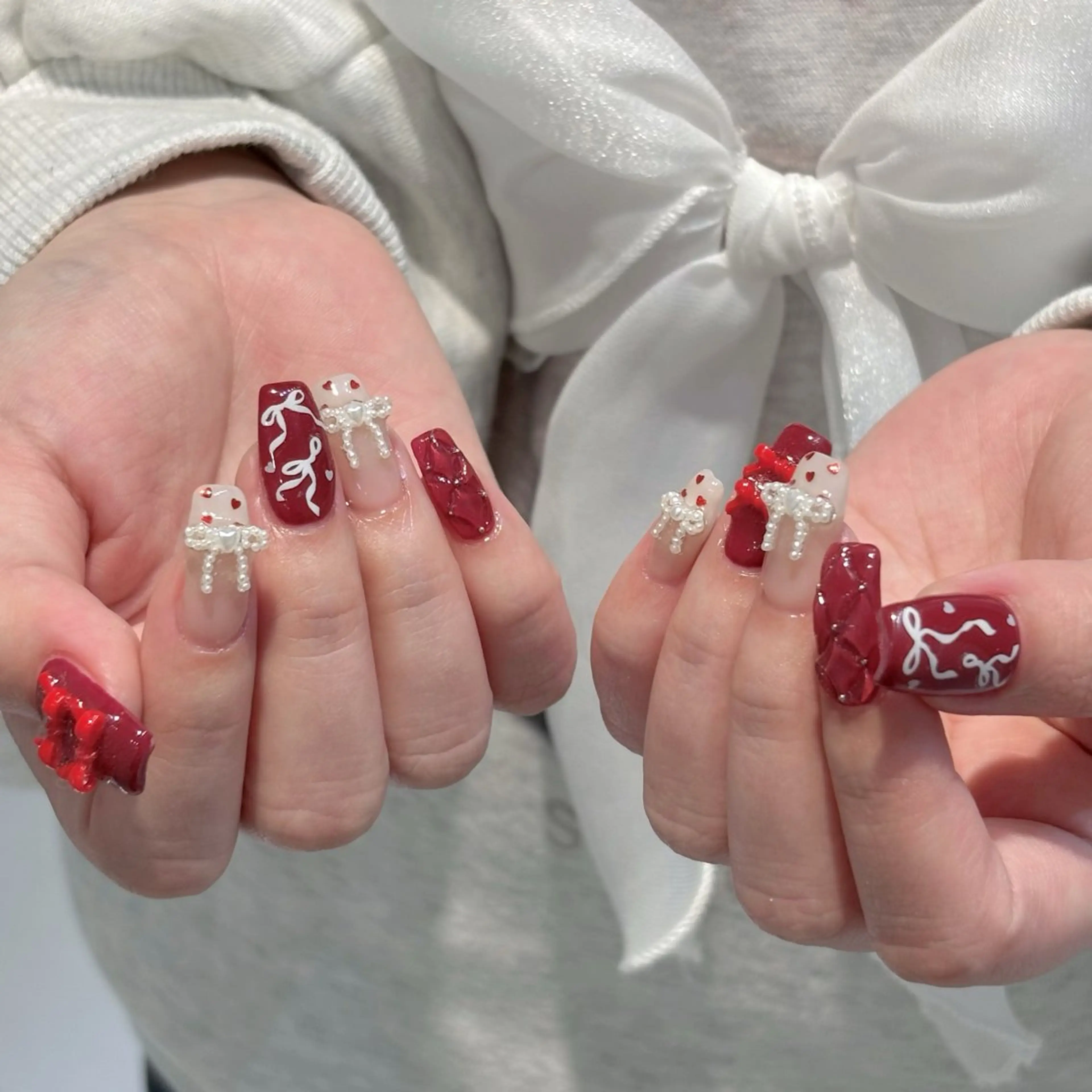 ネイル ガーリー リボン 冬ネイル ハンドネイル 🩰ミキ/韓国♡ girlyネイル🩰のネイルデザイン