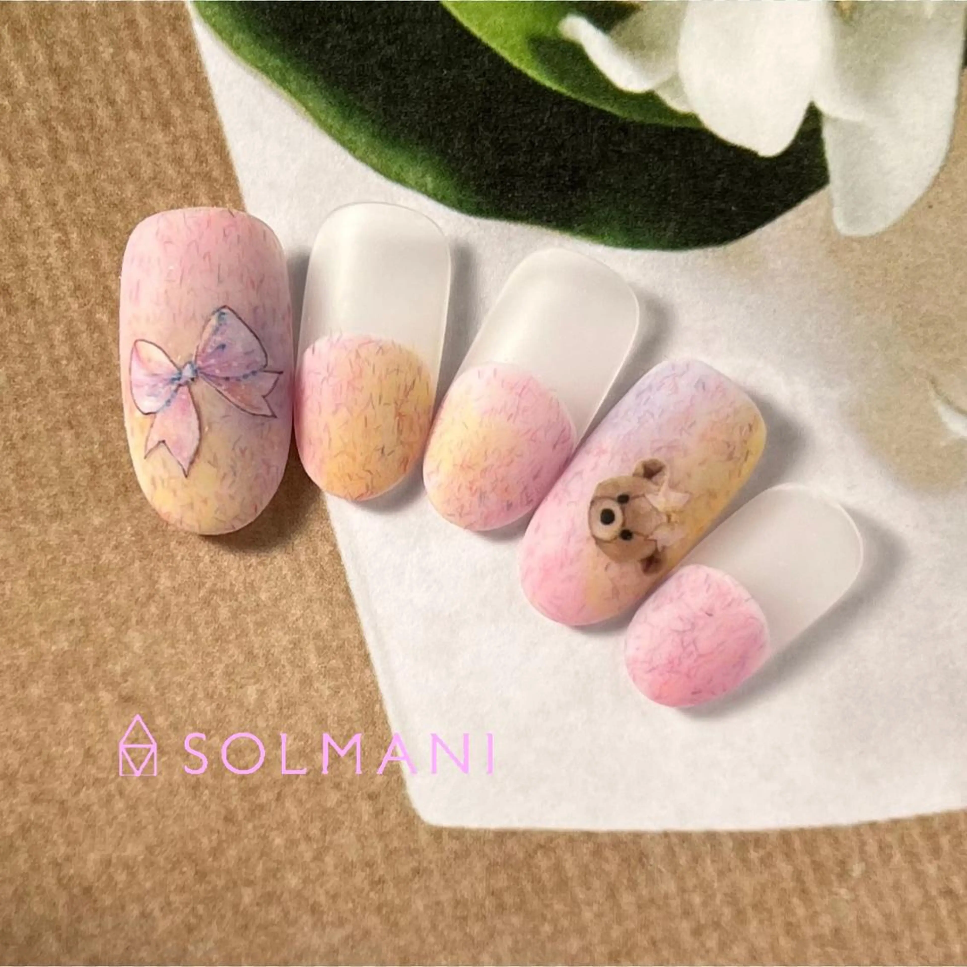 ネイル リボン SOLMANI 予約担当のネイルデザイン