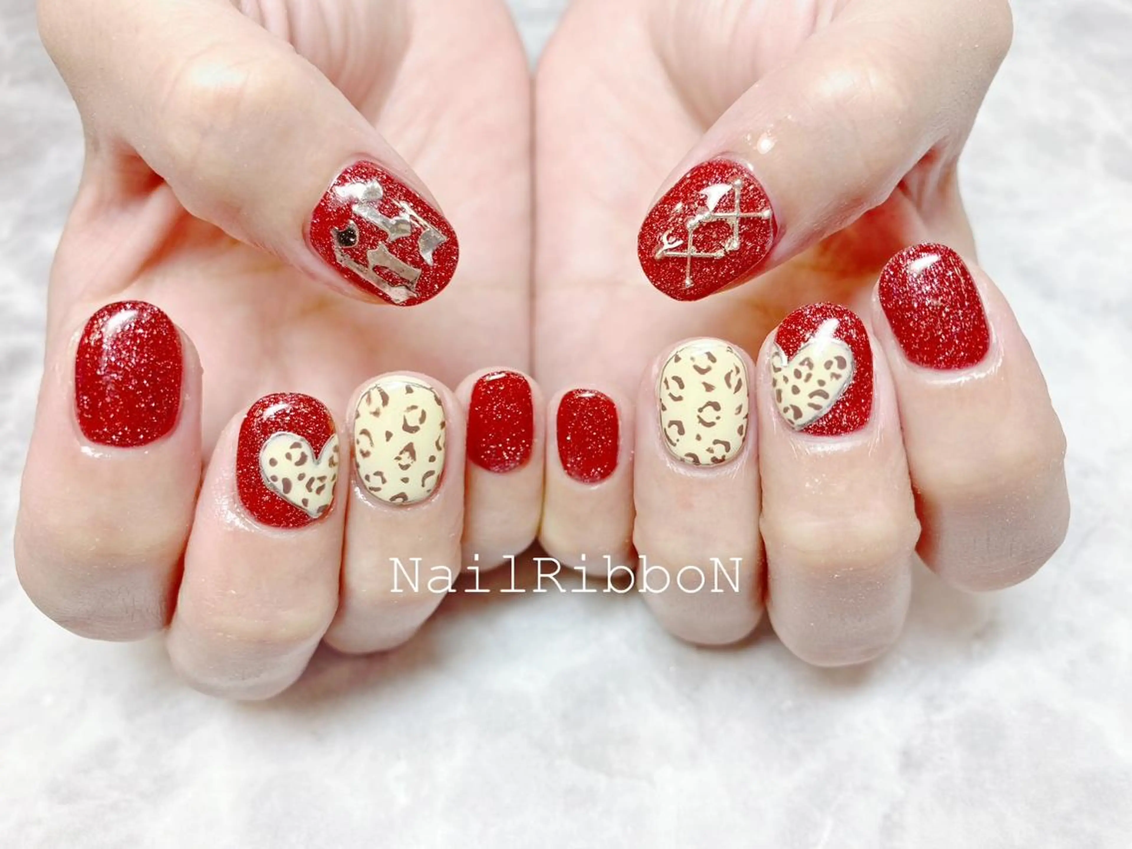 ネイル ネイルリボン 受付スタッフのネイルデザイン