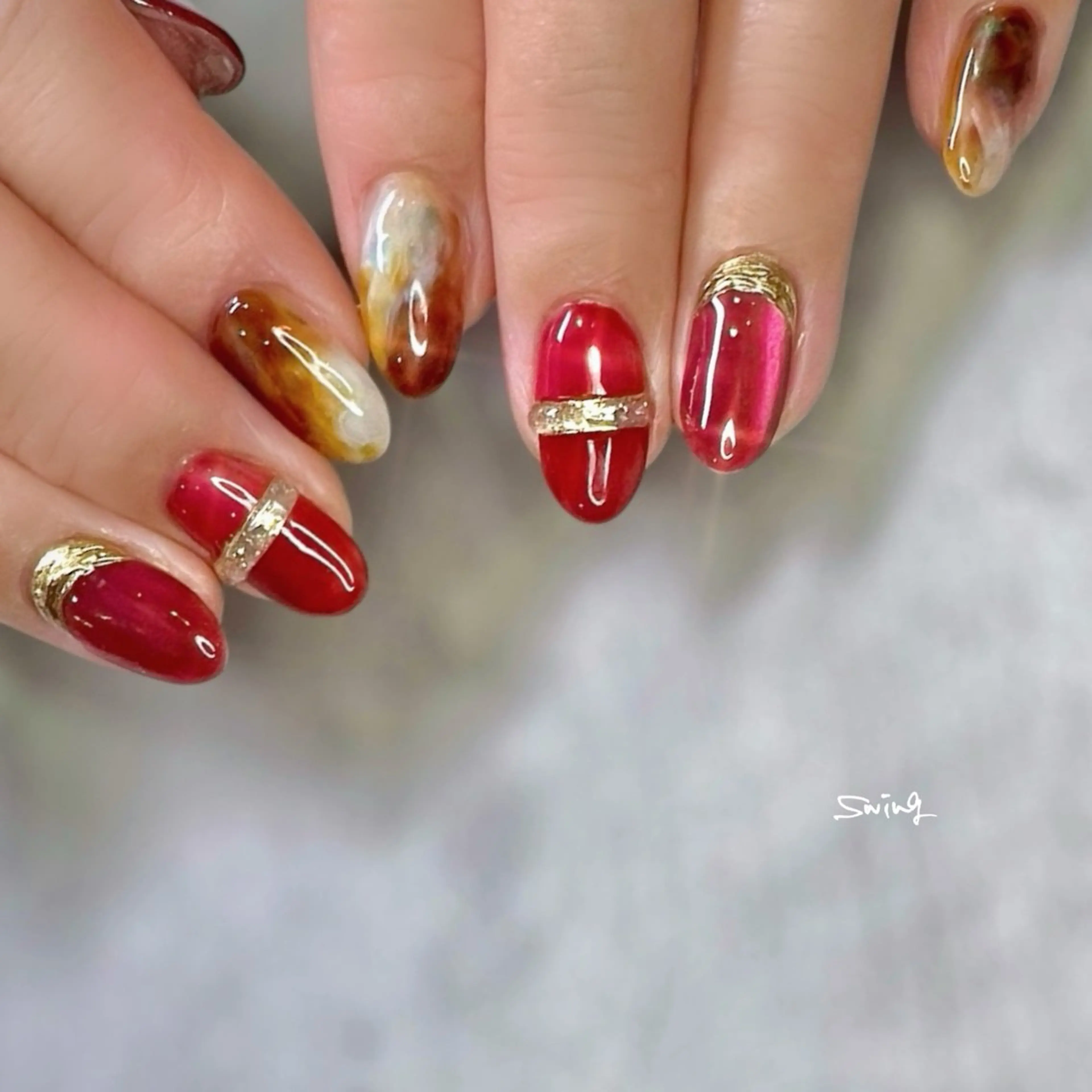 ネイル マグネットネイル 赤色 SWING Nail Salon所属・Yoshida Takakoのネイルデザイン