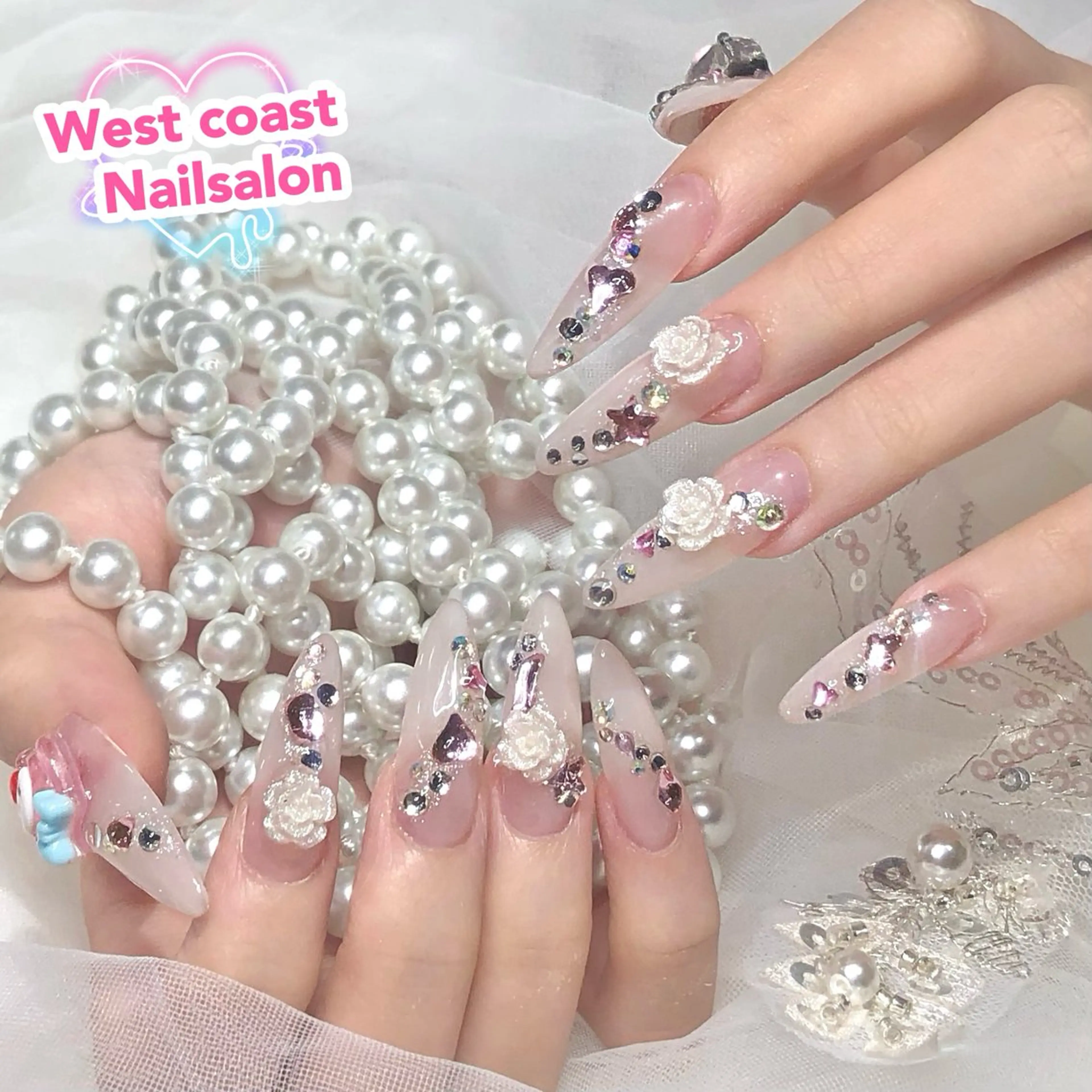 ネイル ストーンネイル リボン、ガーリー パーツ放題専門店のネイルデザイン