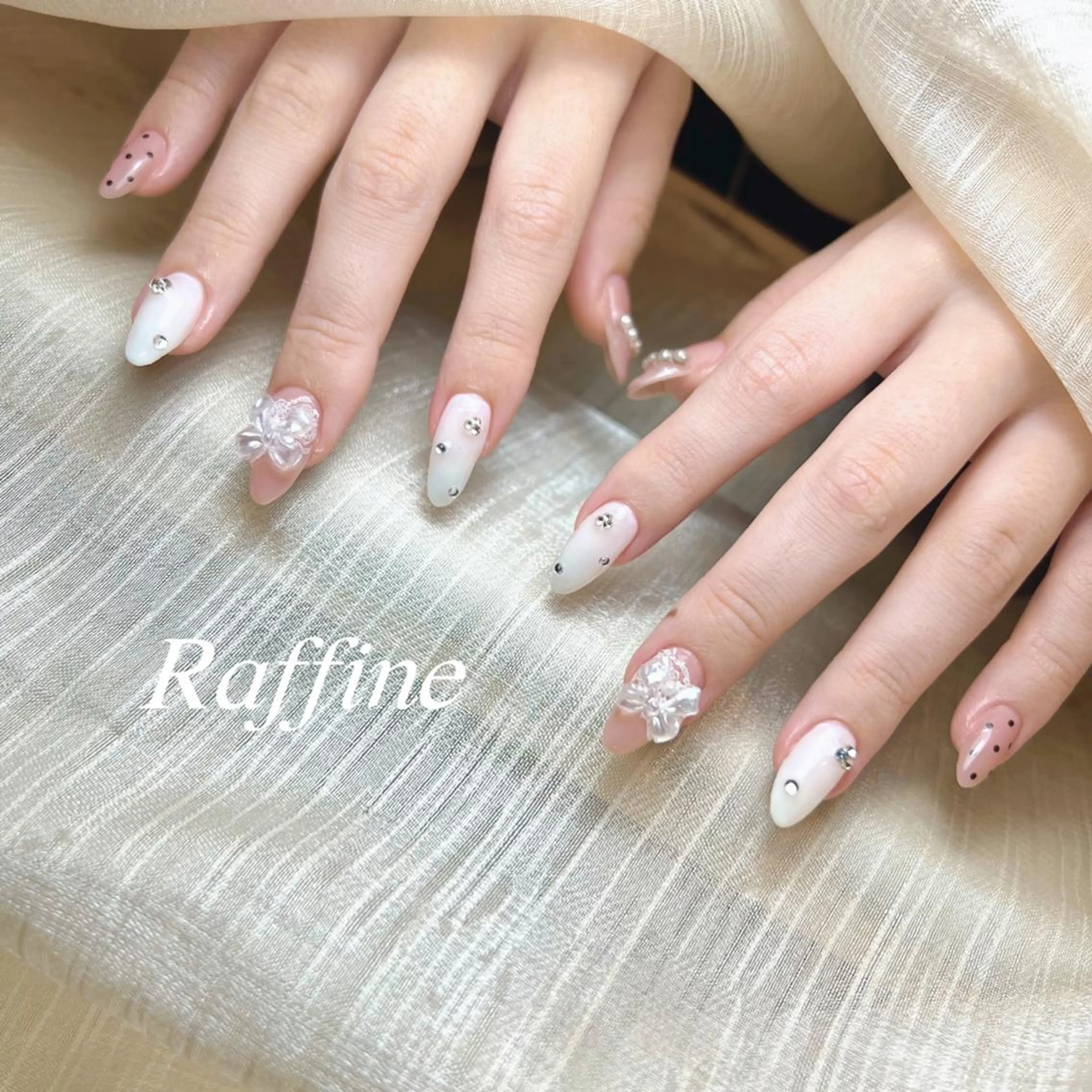 ネイル RAFFINE 月🦋🩵のネイルデザイン