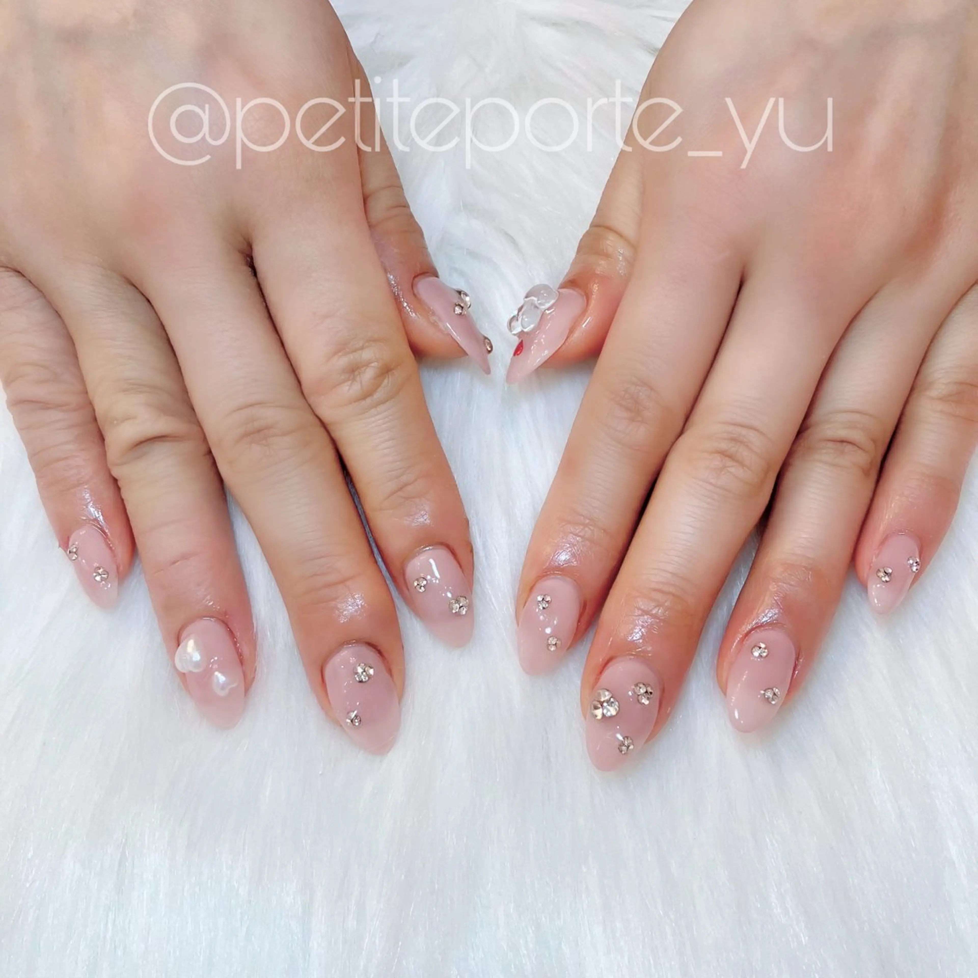 ネイル アートネイル 長さ出し ハート 春ネイル ホワイト ハンドネイル nailsalon petite porte所属・petite porteのネイルデザイン