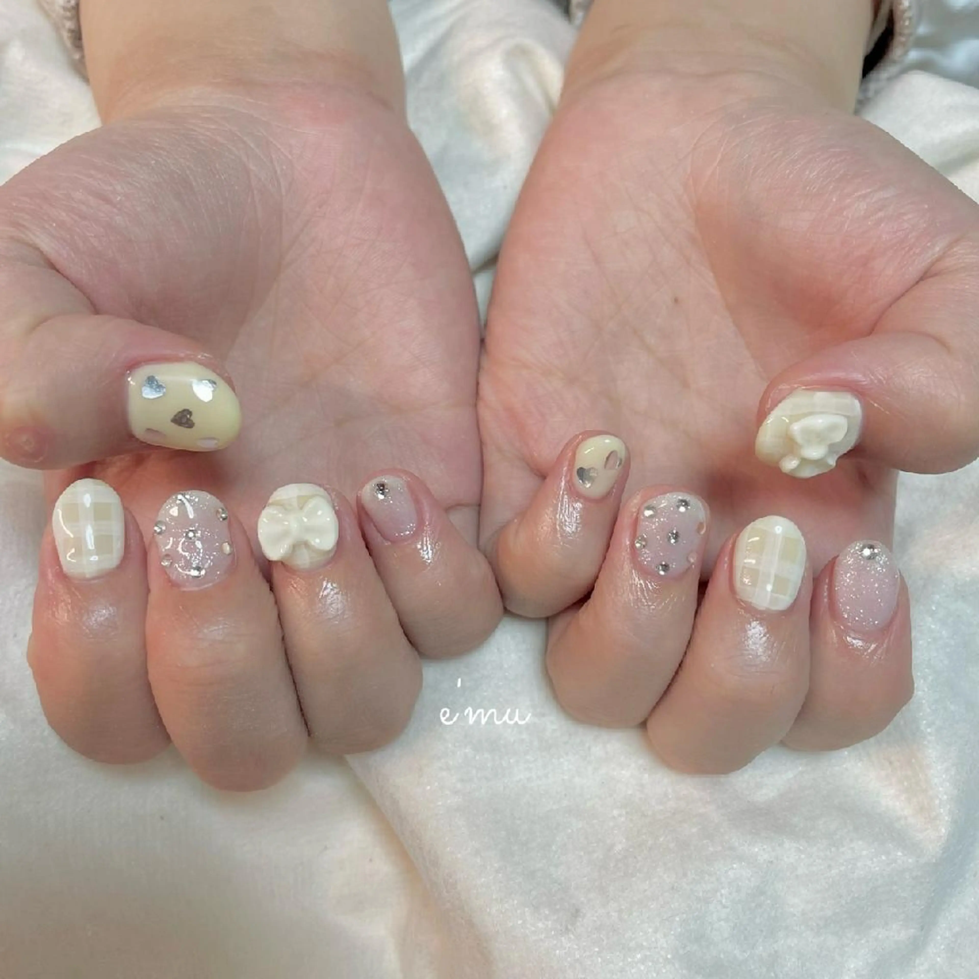 ネイル ガーリー パステルネイル リボン 春ネイル 黄色 nail salon e'mu💐のネイルデザイン