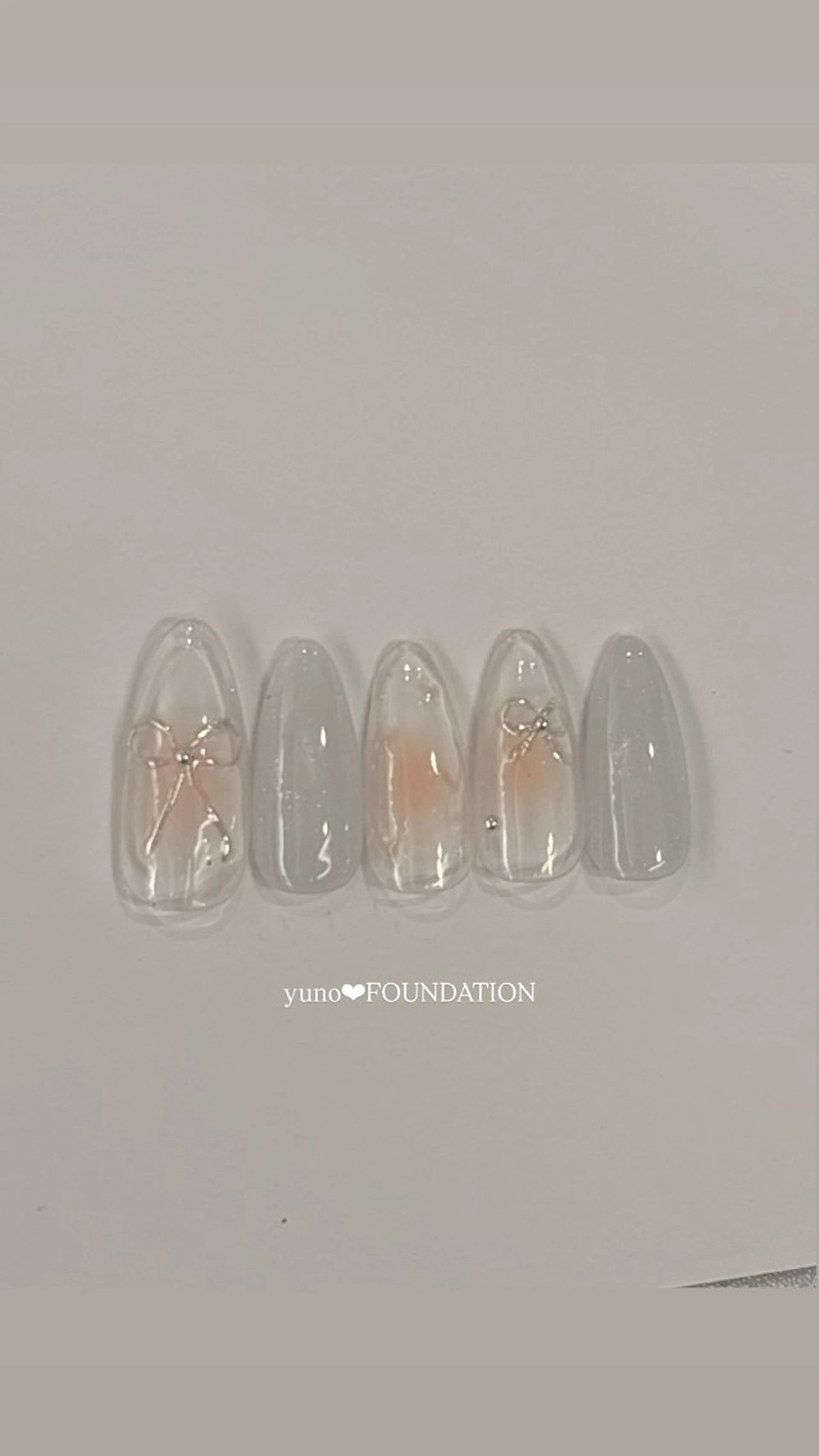 ネイル チークネイル リボン 春ネイル ハンドネイル FOUNDATION所属・yuno❤︎ FOUNDATIONのネイルデザイン