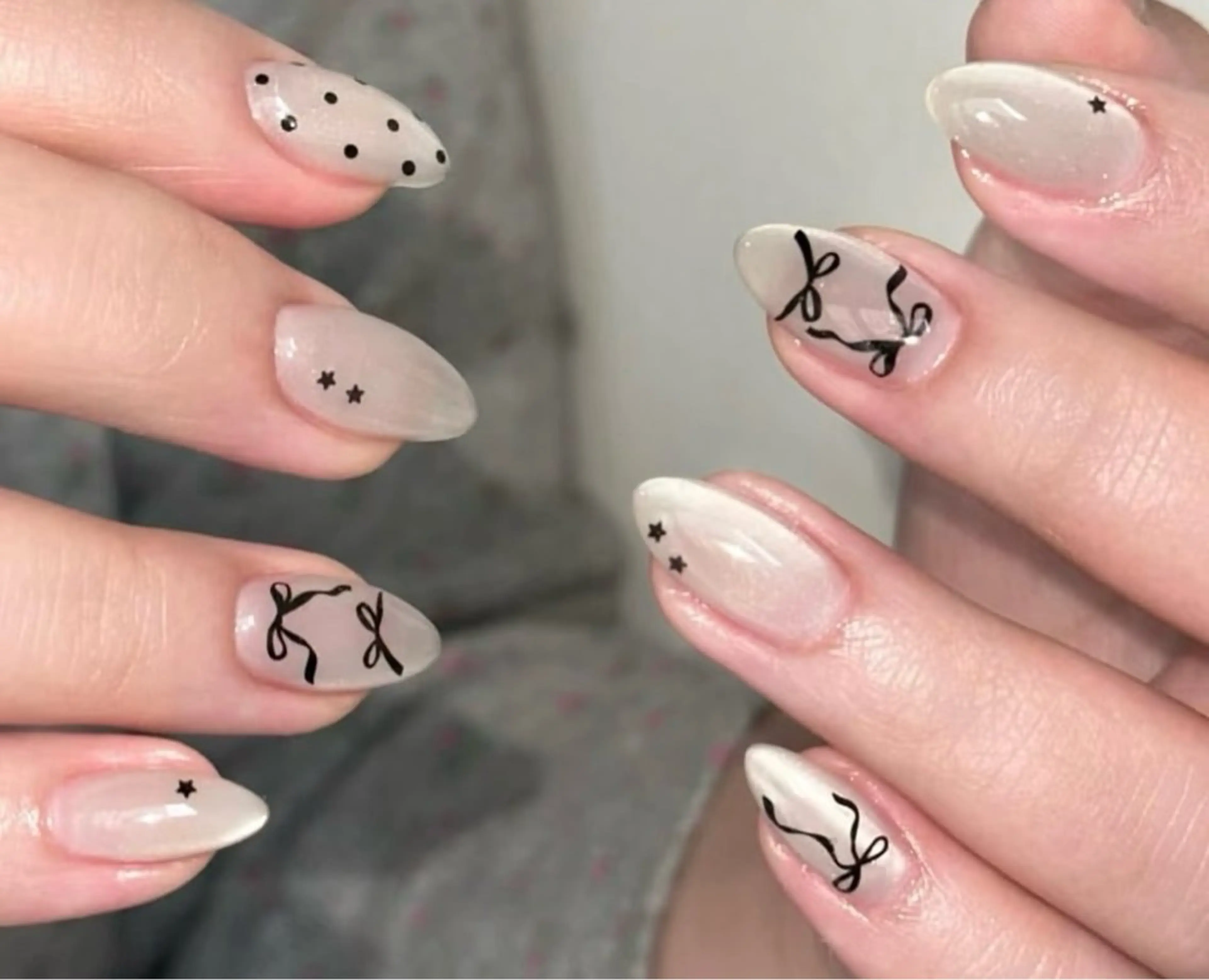 ネイル アートネイル ガーリー マグネットネイル ニュアンスネイル リボン ハンドネイル ハンドケア DarkHoney 池袋店のネイルデザイン