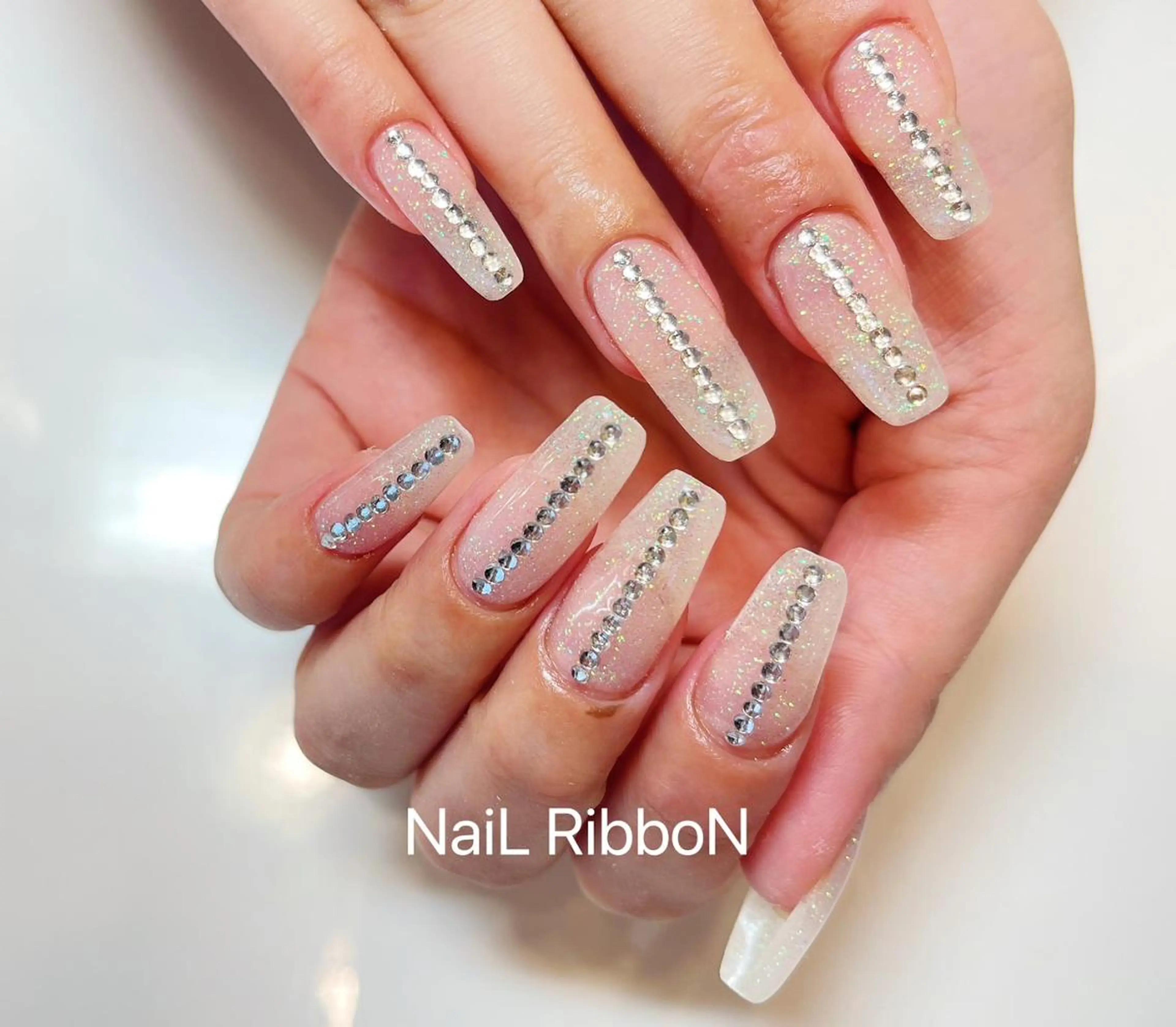 ネイル ネイルリボン 受付スタッフのネイルデザイン