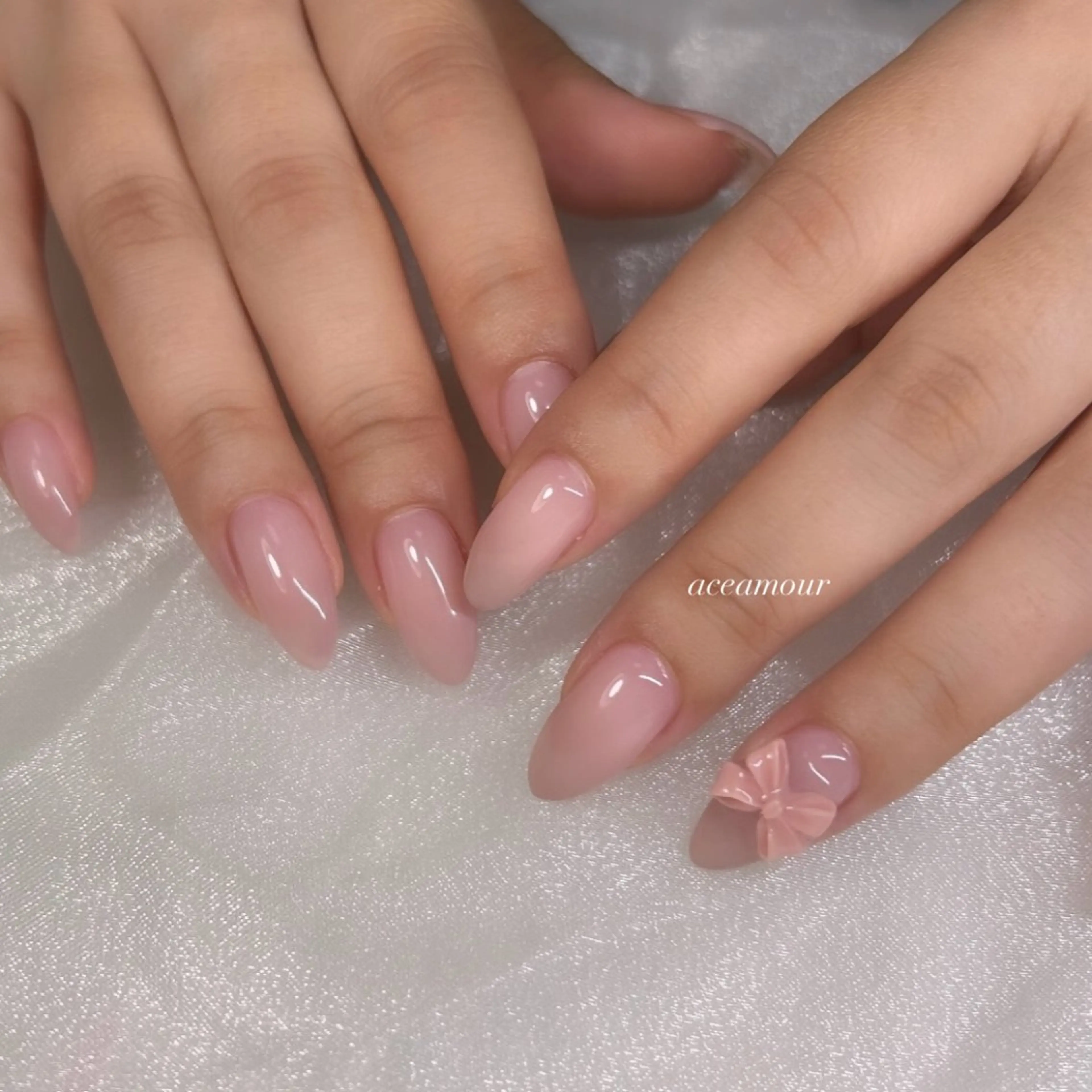 ネイル グラデーション ピンク リボン ハンドネイル ハンドケア ネイル/耳つぼ /新ホワイトニングのネイルデザイン