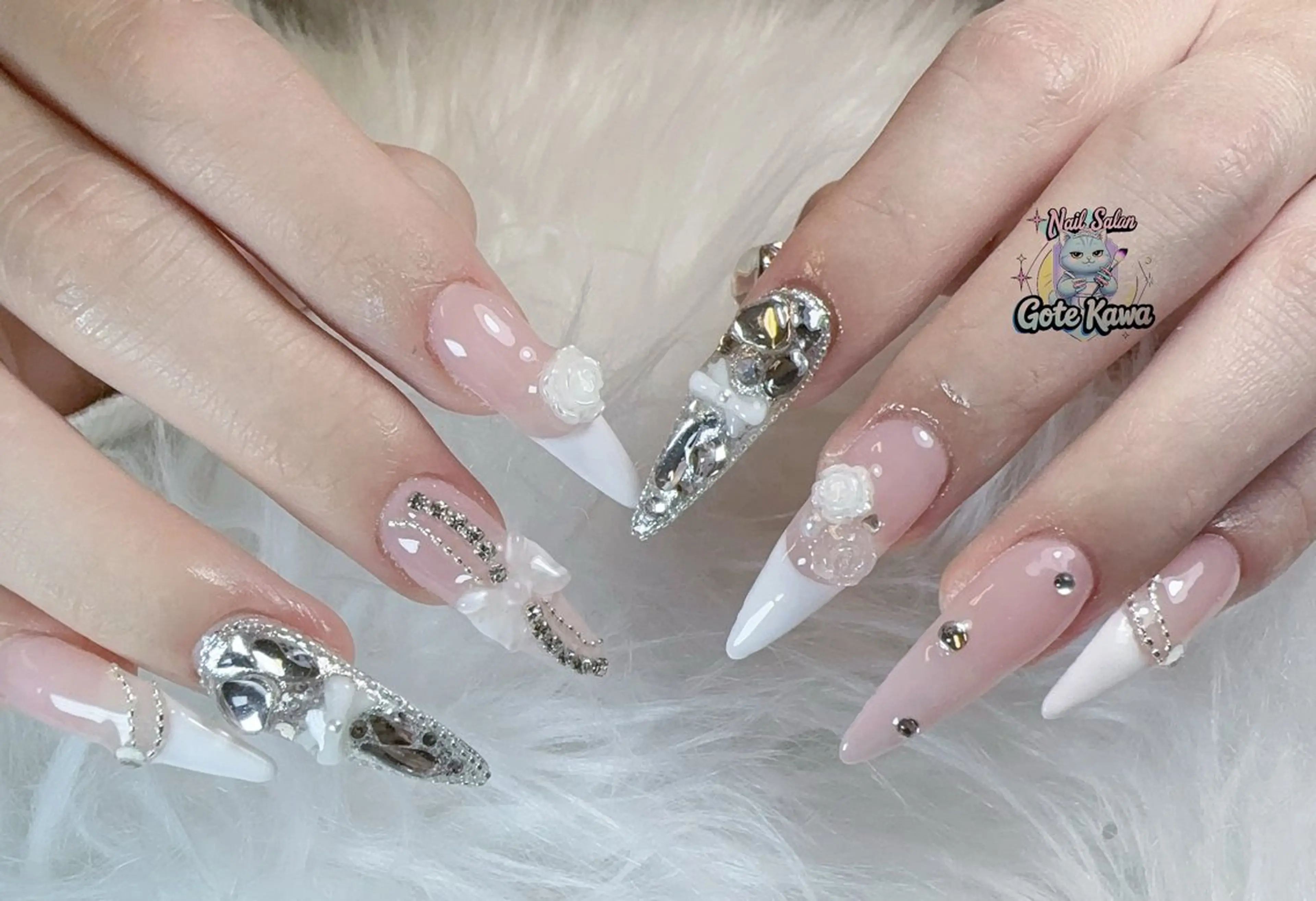 ネイル アートネイル 長さ出し キラキラネイル ピンク リボン ハンドネイル ハンドケア GOTE KAWA Nail Salon(ゴテかわ)所属・Gote Kawa nail salonのネイルデザイン