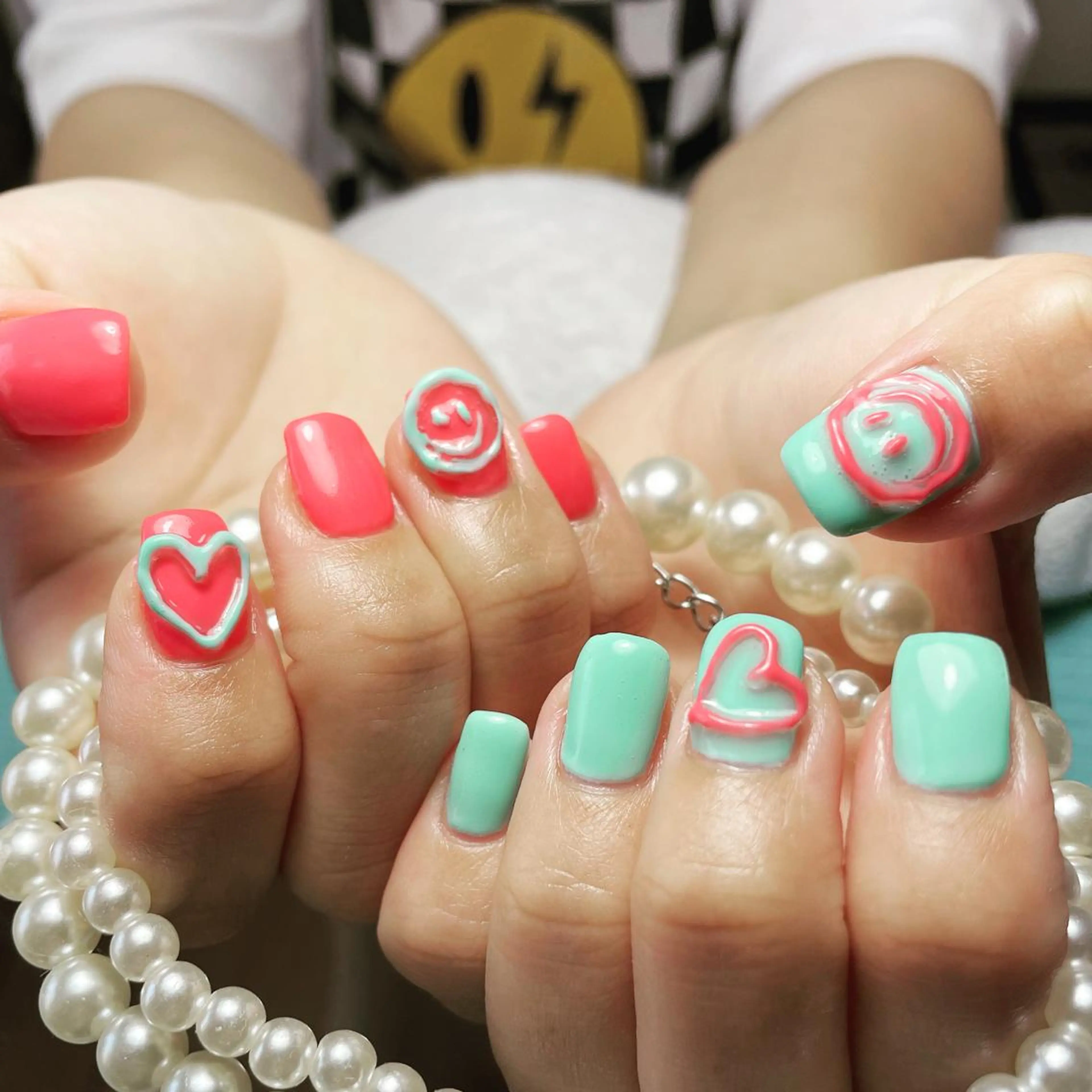 ネイル グリーン ピンク 加瀬 アンジェリーのネイルデザイン