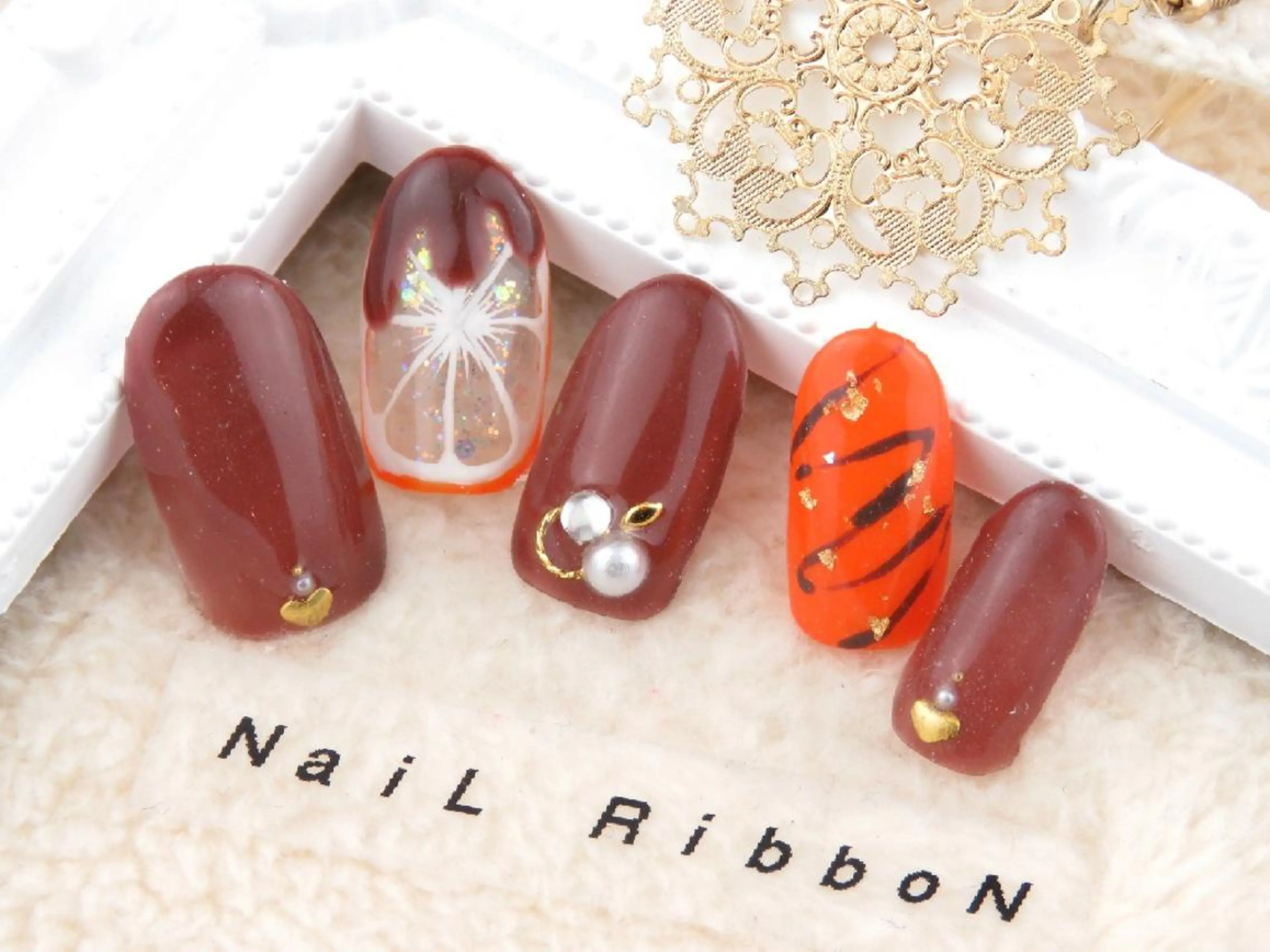 ネイル ネイルリボン 受付スタッフのネイルデザイン