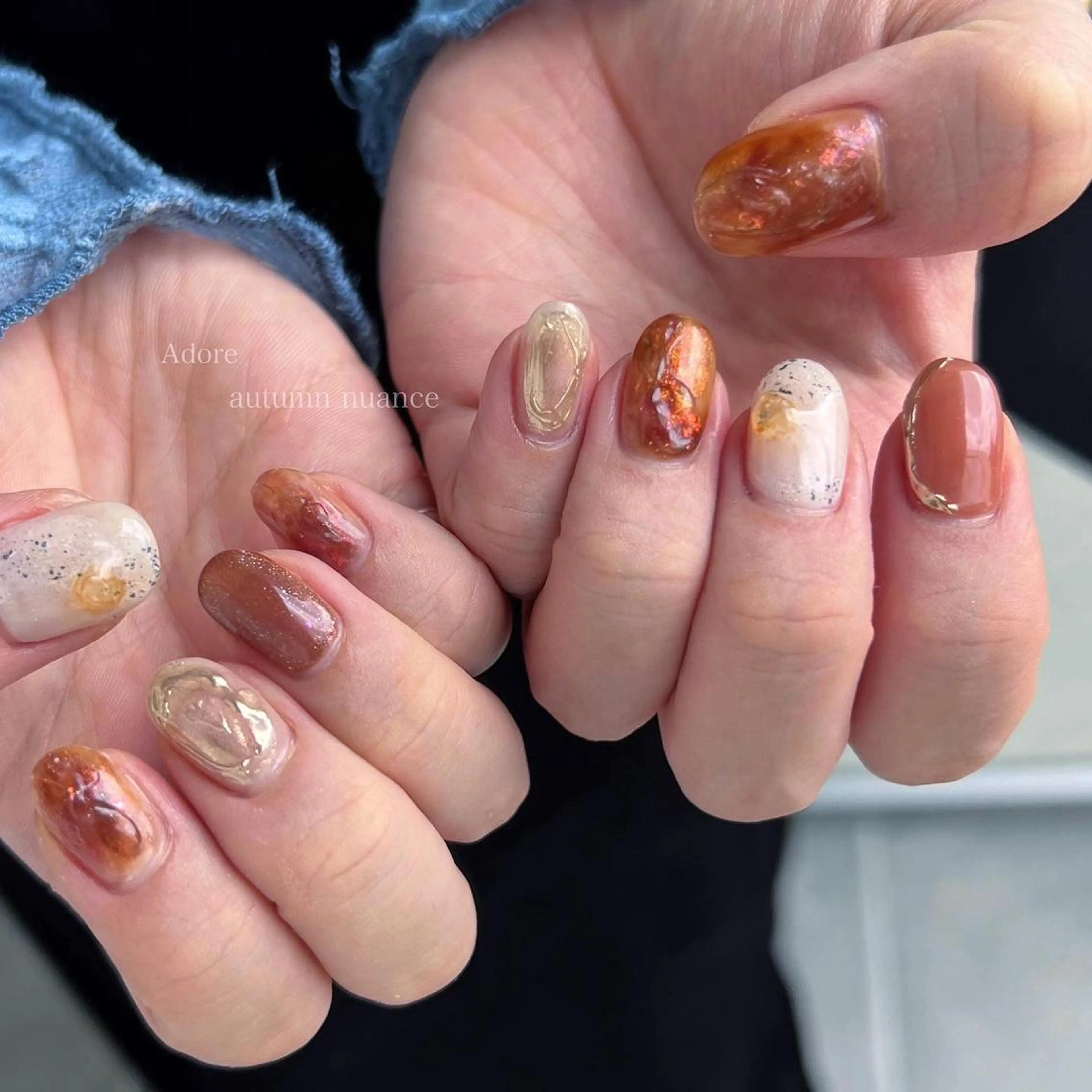 ネイル べっ甲ネイル ブラウン ミラーネイル ニュアンスネイル ハンドネイル Nail Adore.のネイルデザイン