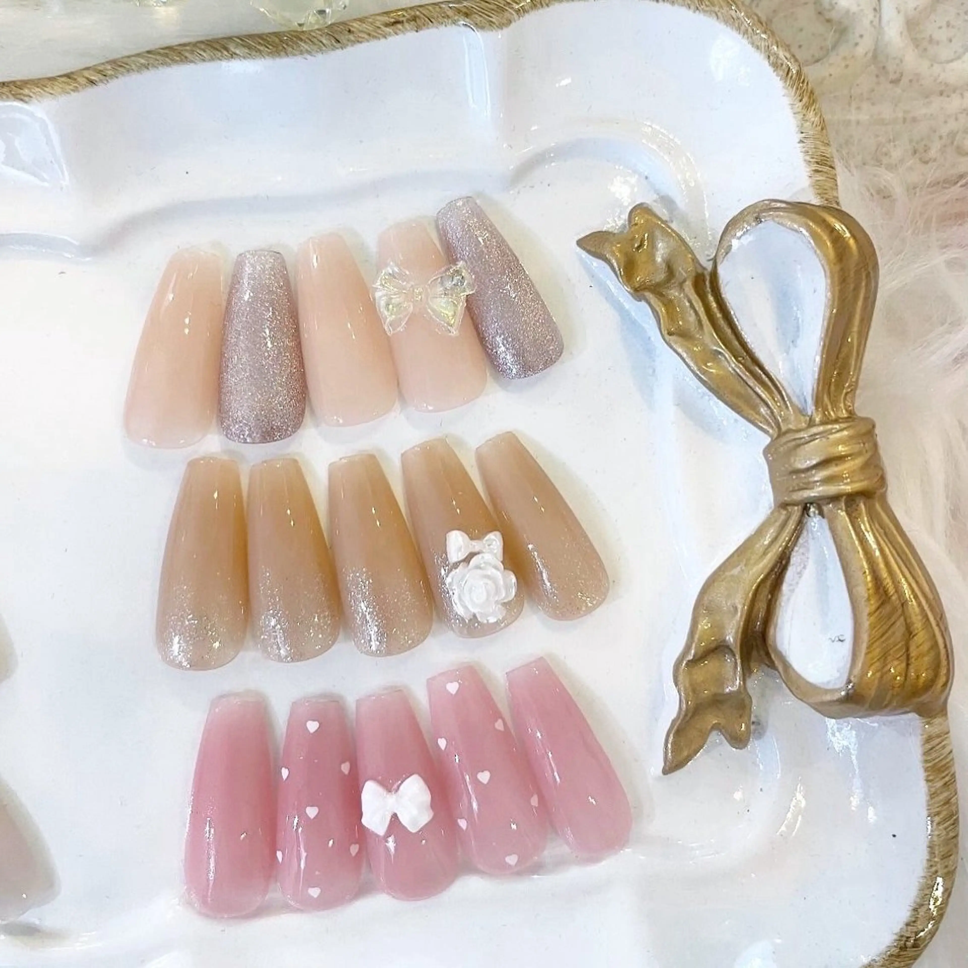 ネイル リボン Lunasis/ Kiraraのネイルデザイン