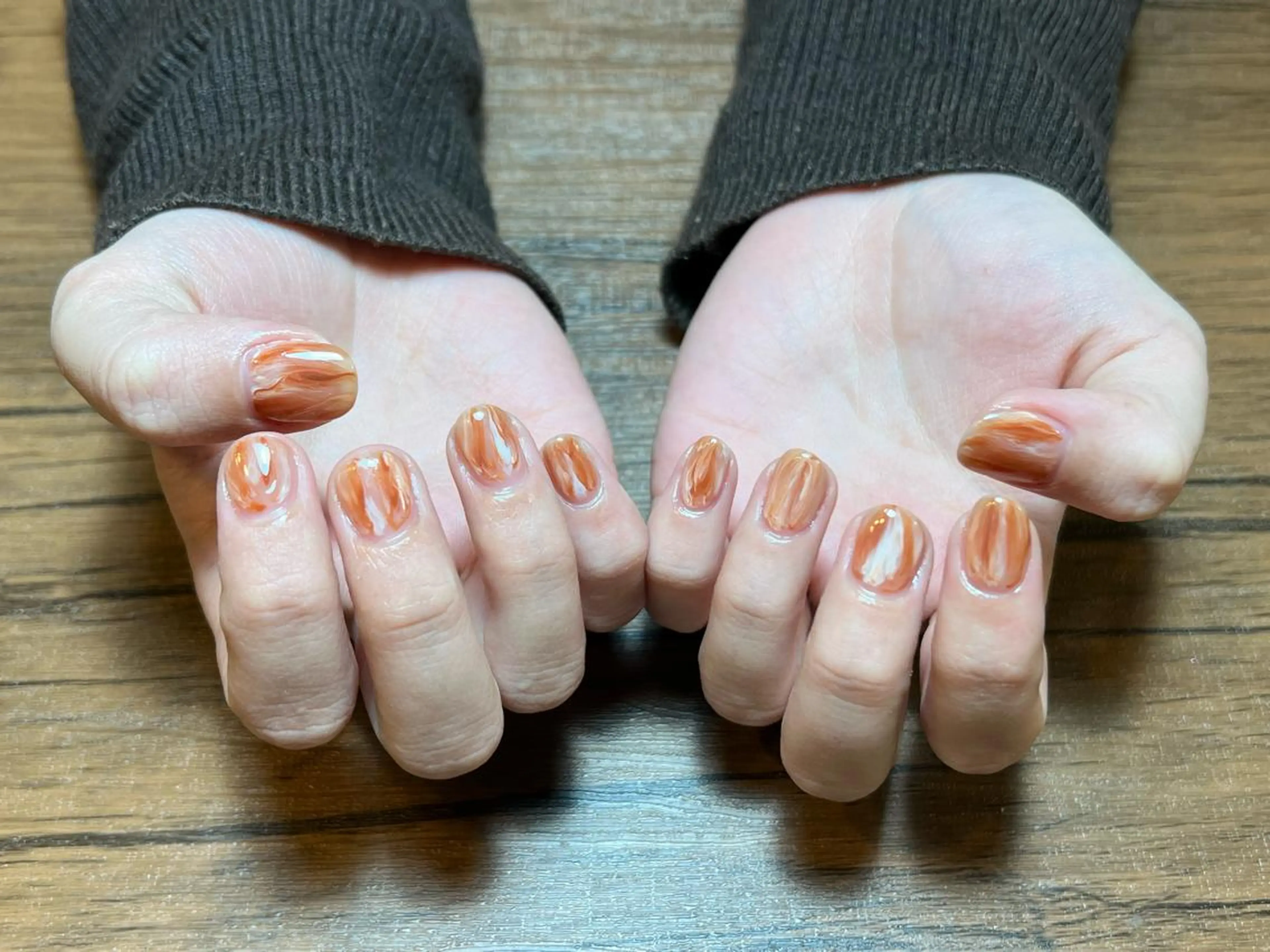 ネイル 大理石ネイル(マーブル) オレンジ ハンドネイル HENRIETTA NAILSALONのネイルデザイン