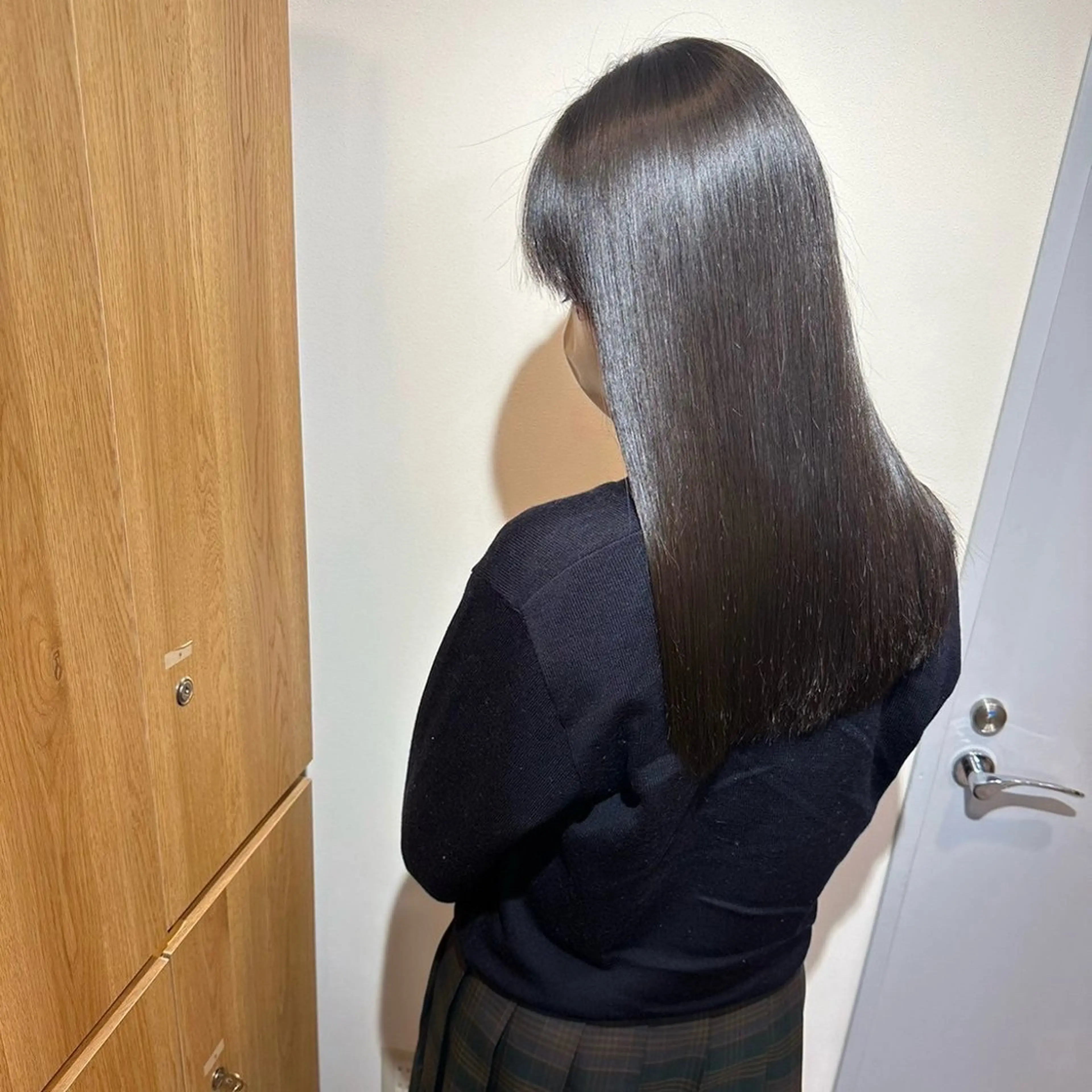 ロング 岡田 佳子のヘアスタイル