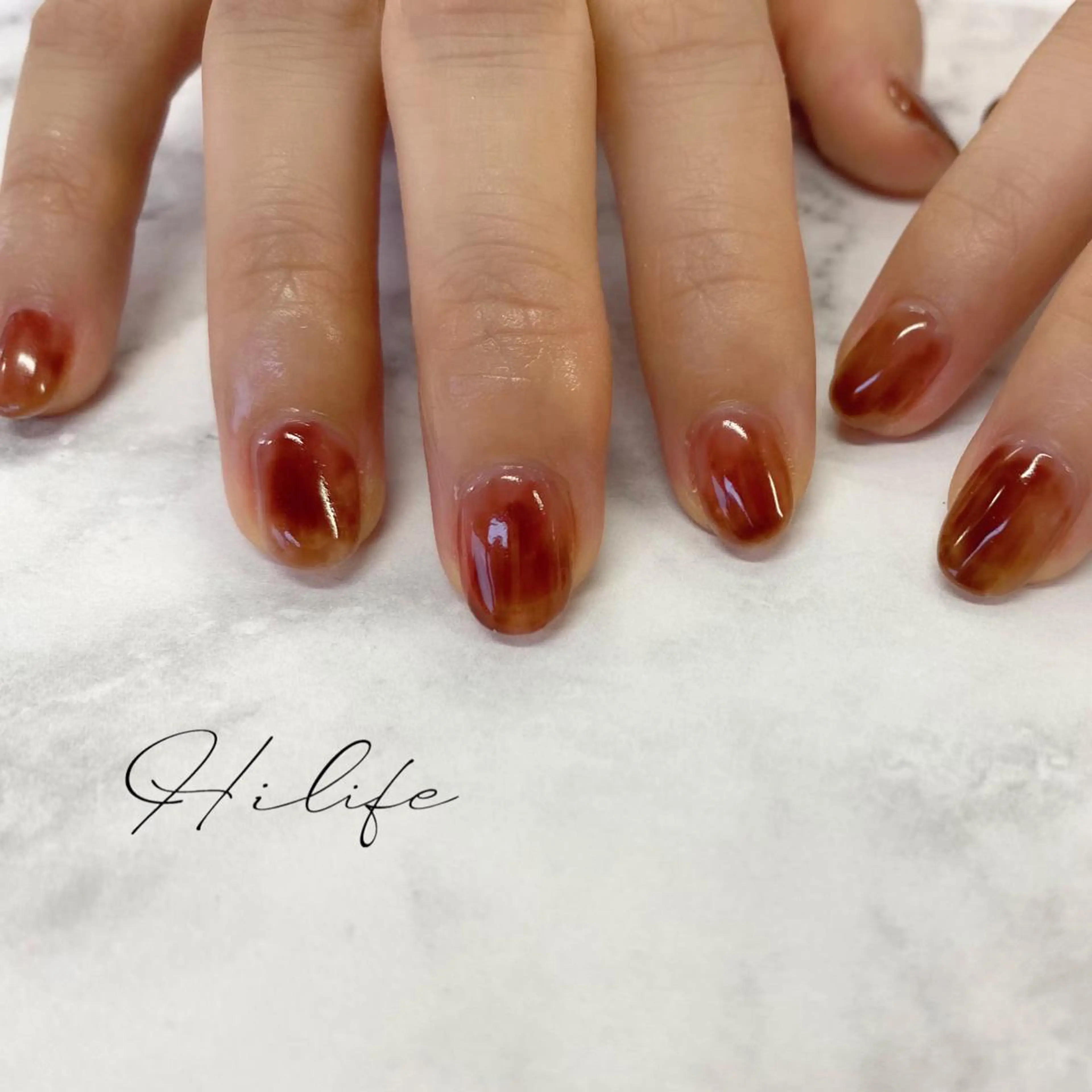 ネイル ブラウン ニュアンスネイル Nail Adore.のネイルデザイン