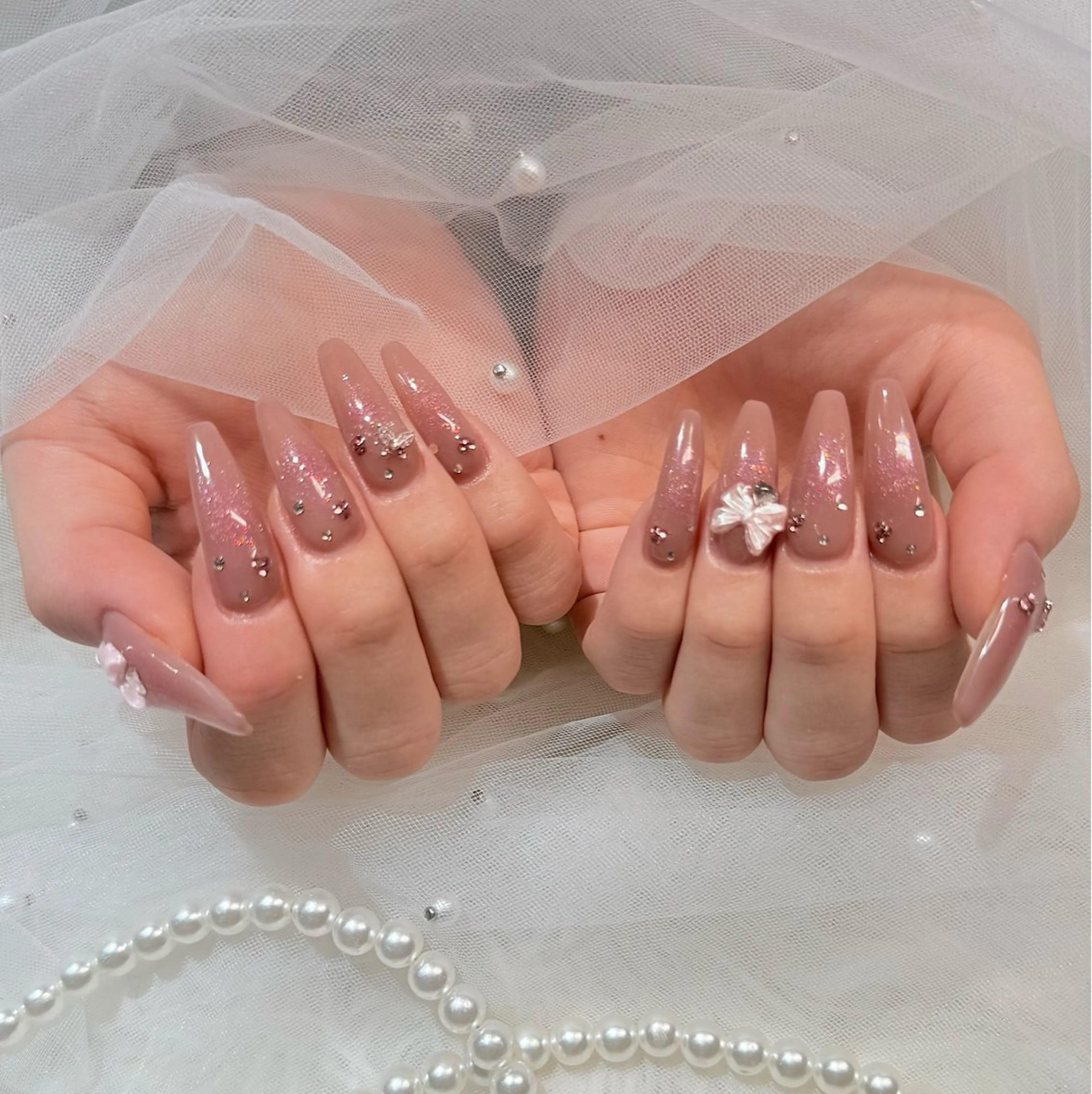 ロング ハンドネイル ハンドケア マシェリローズ所属・Macherie Roseのネイルデザイン