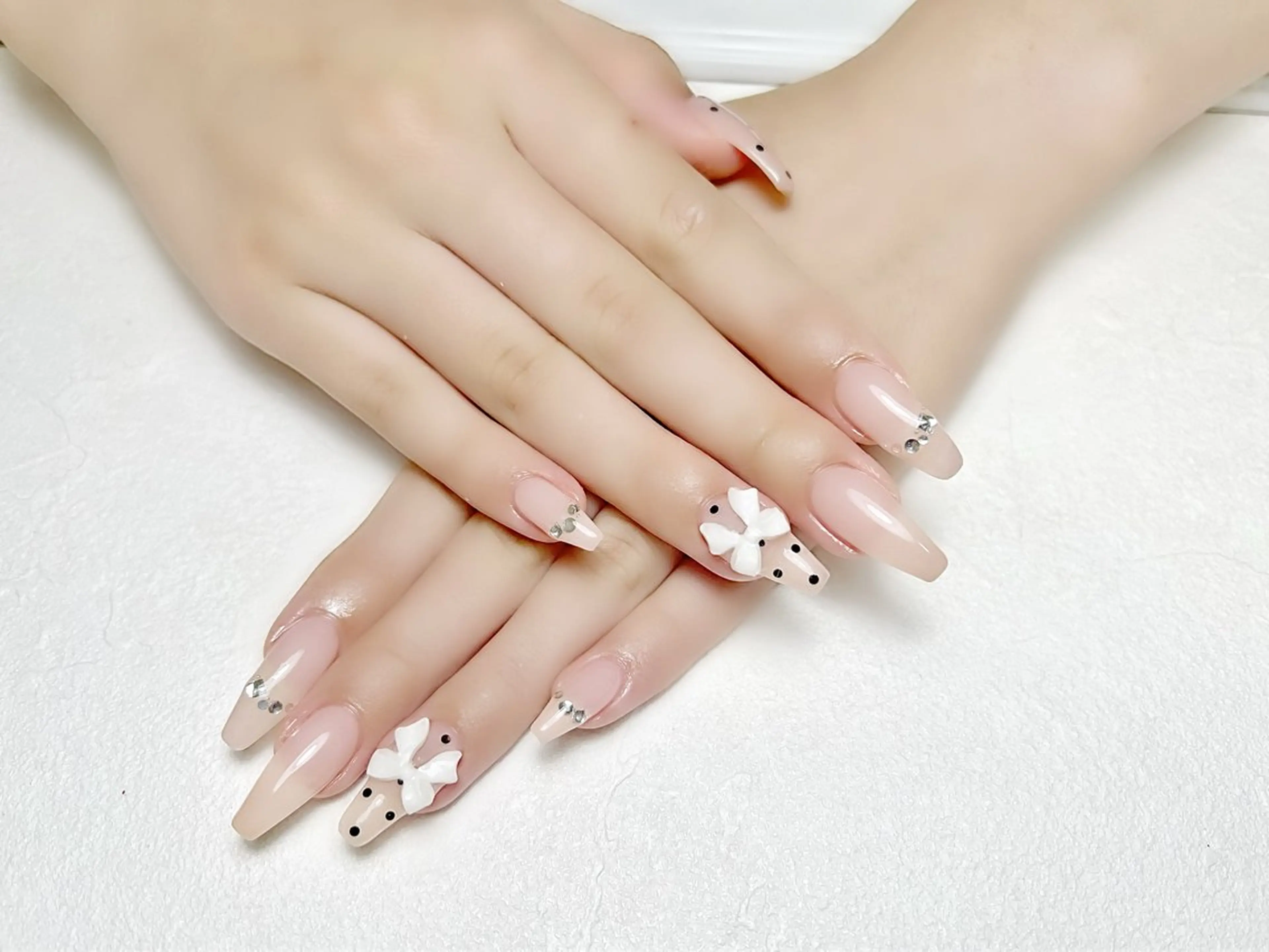 ネイル ドット ガーリー ピンク リボン rouse nail RISATOのネイルデザイン