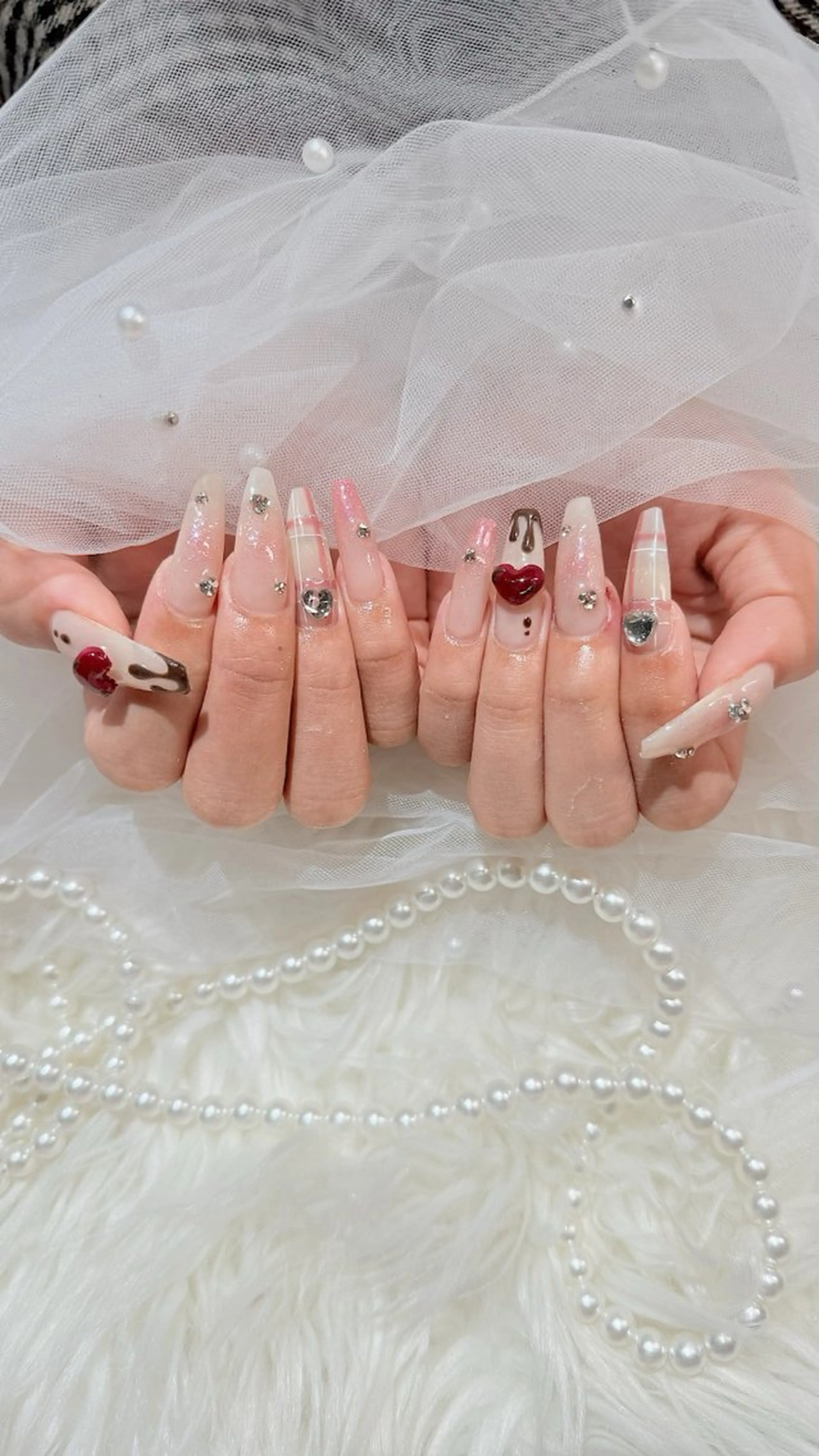 ロング ハンドネイル ハンドケア マシェリローズ所属・Macherie Roseのネイルデザイン