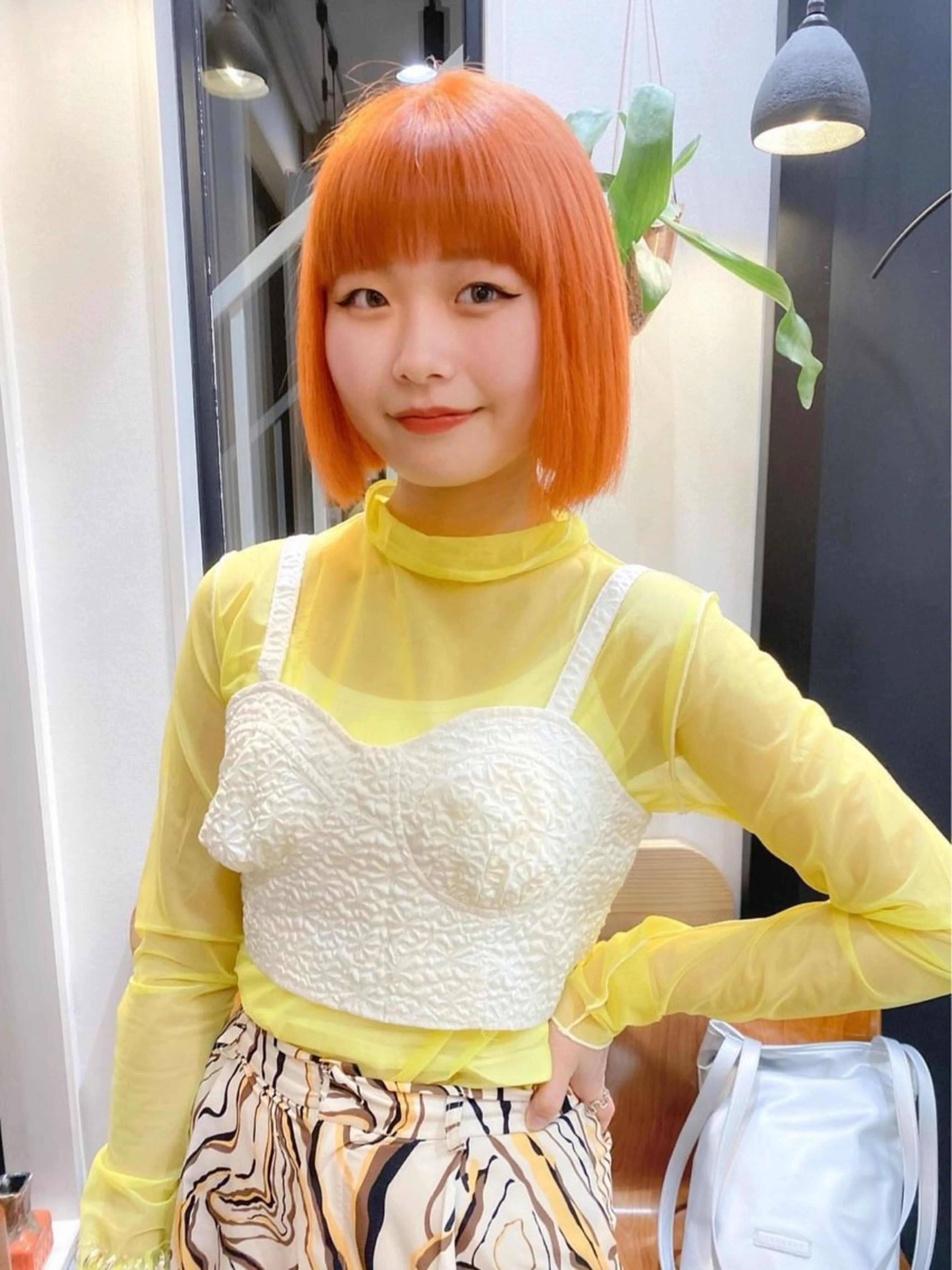 カラー オレンジ kana ARENDのヘアスタイル