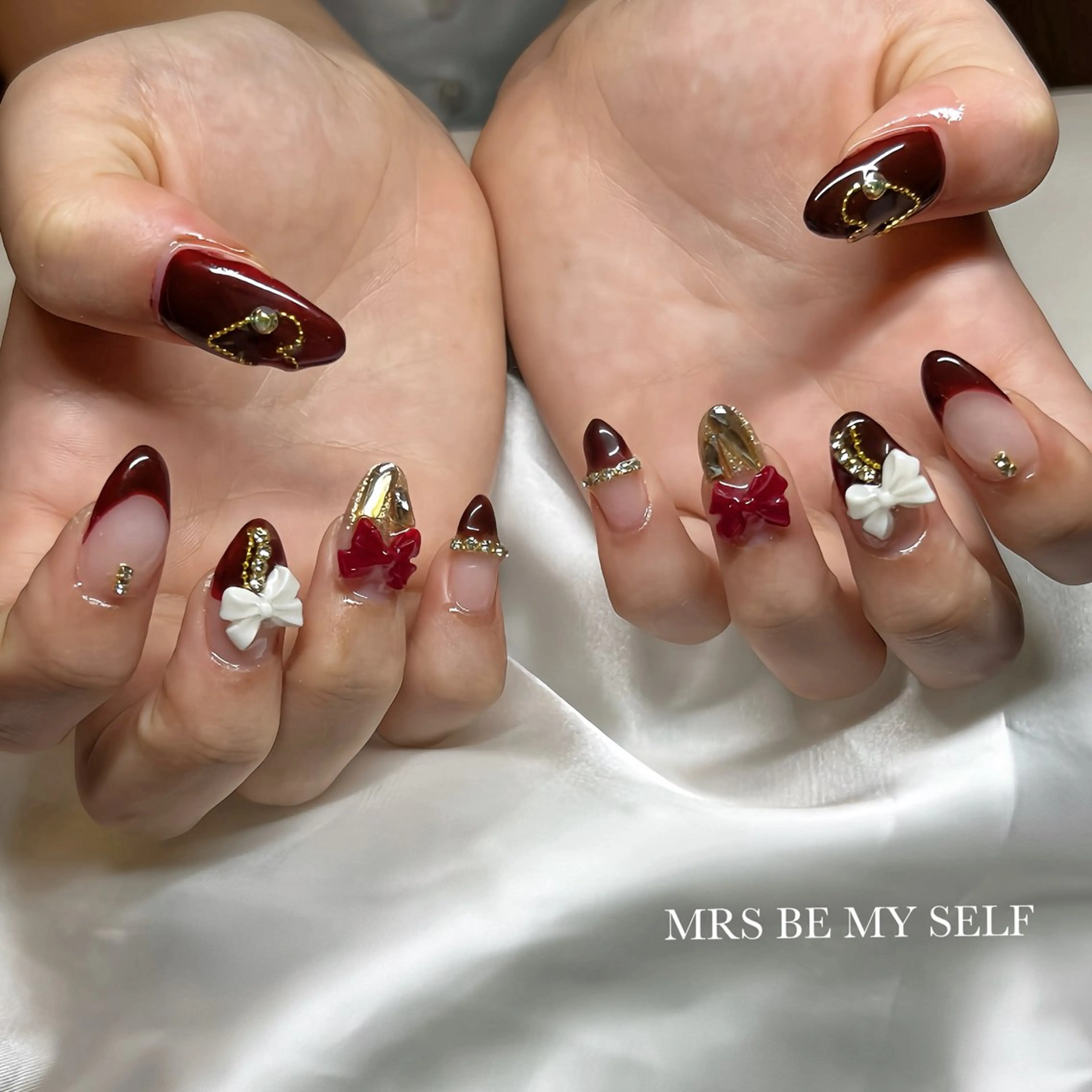 ネイル ボルドー ゴールド ハート リボン ハンドネイル MRS/ miyu🎀のネイルデザイン