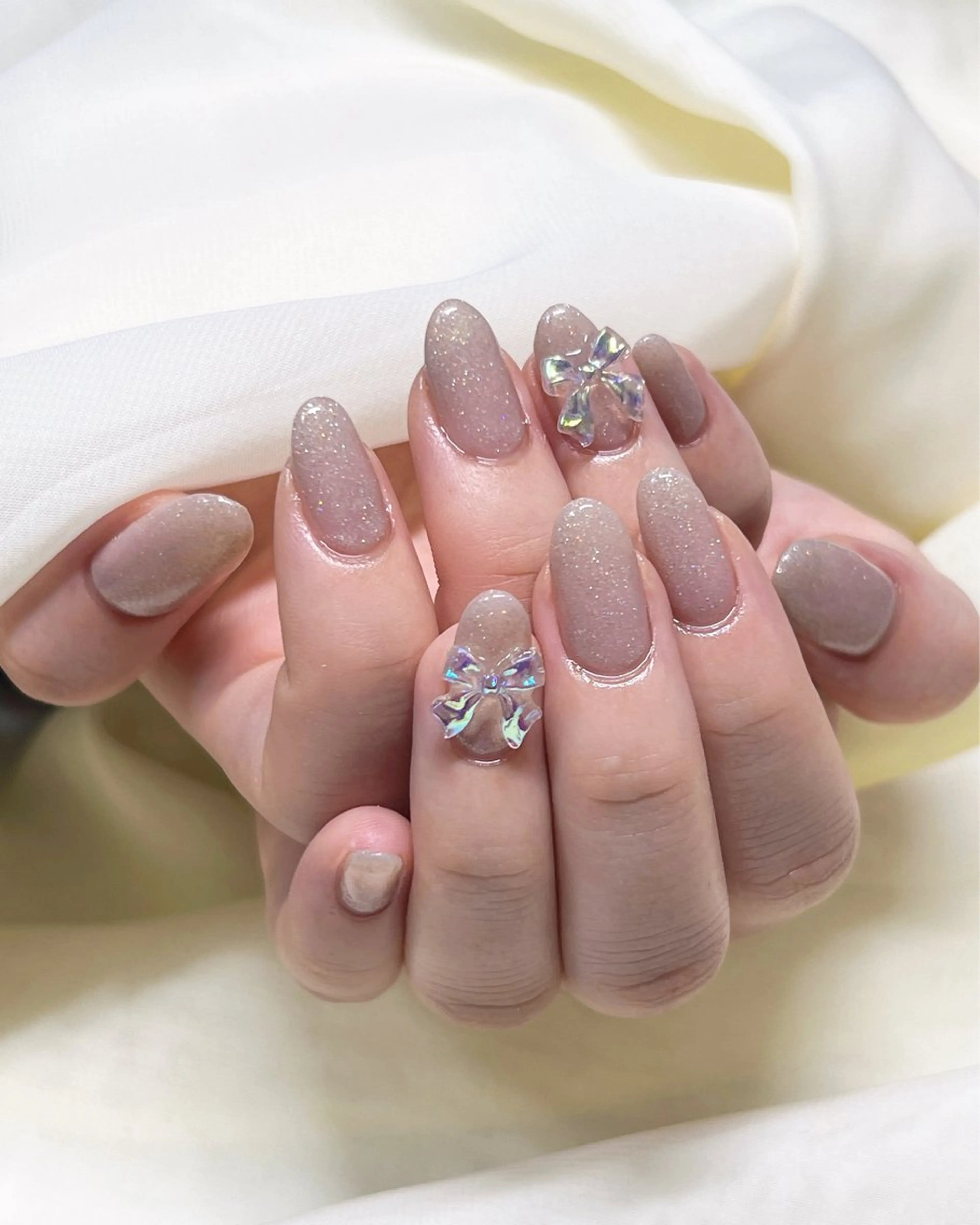 ネイル ラメ(グリッター) ワンカラーネイル リボン nail salon MUAのネイルデザイン