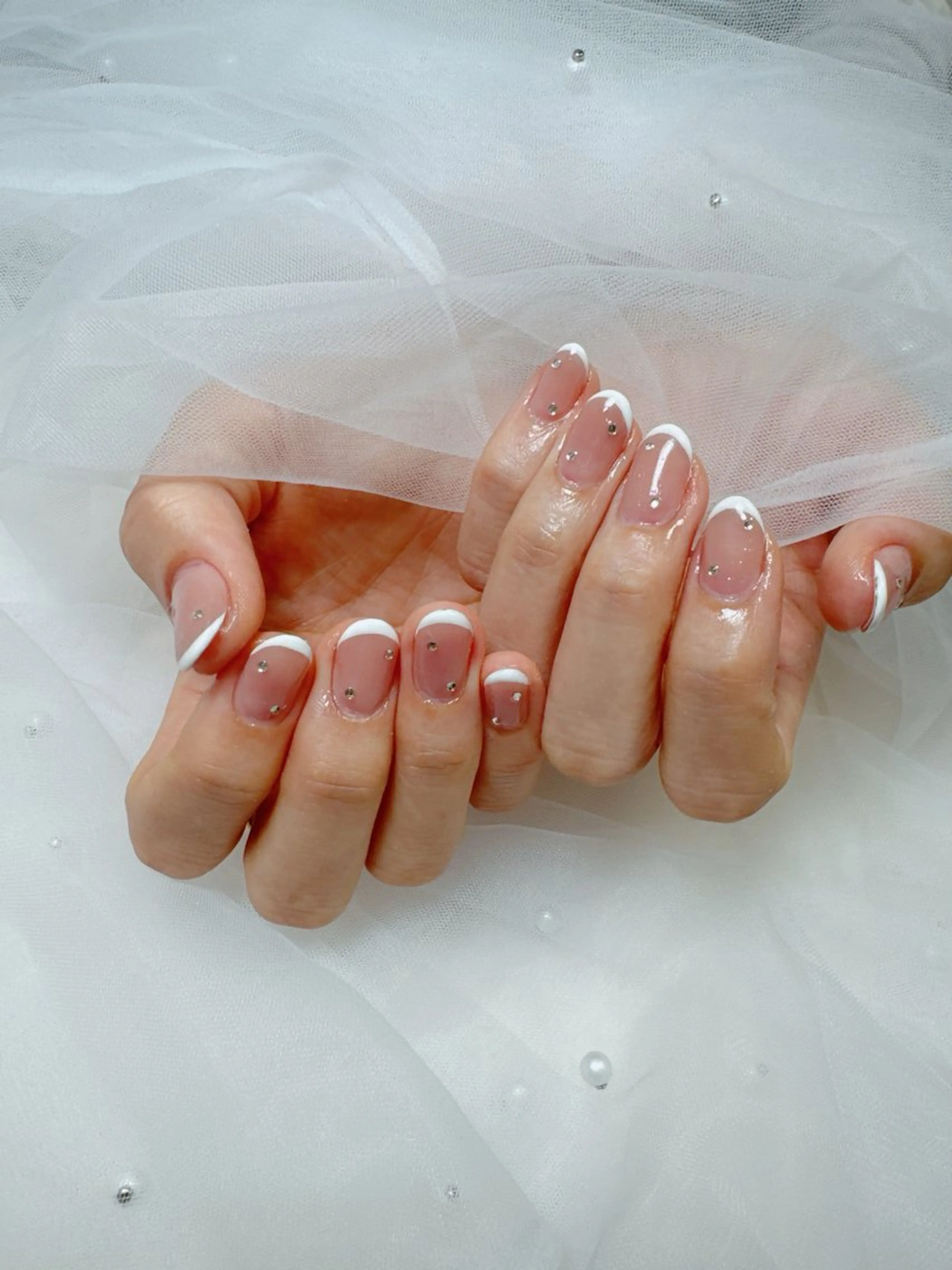 ネイル 成人式 フレンチネイル ジェルネイル ガラスフレンチ ハート ハンドネイル クイーンズネイル銀座所属・Queeens nailのネイルデザイン