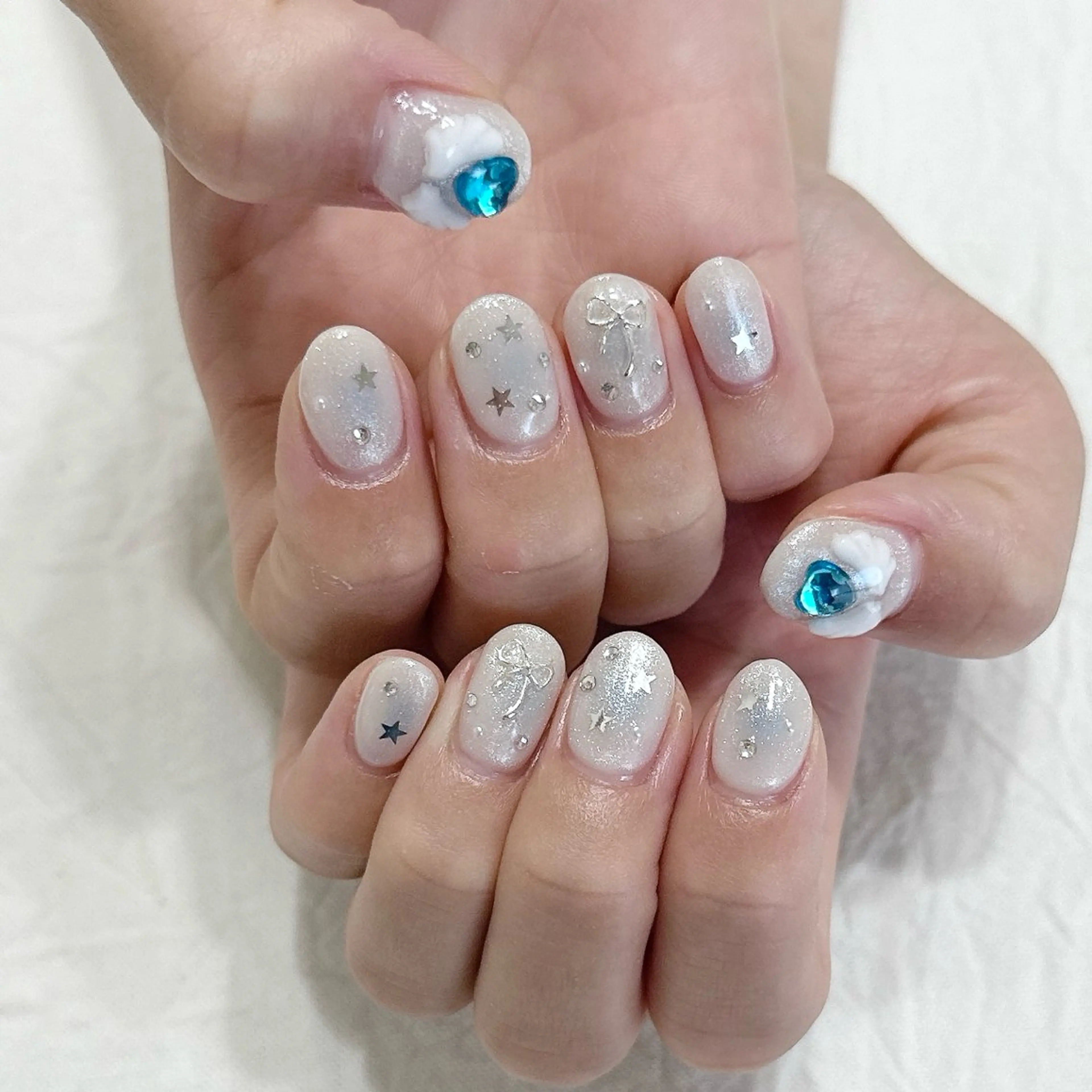 ネイル チークネイル ハート ラメ(グリッター) 水色 ピンク ハンドネイル peaberry nailのネイルデザイン