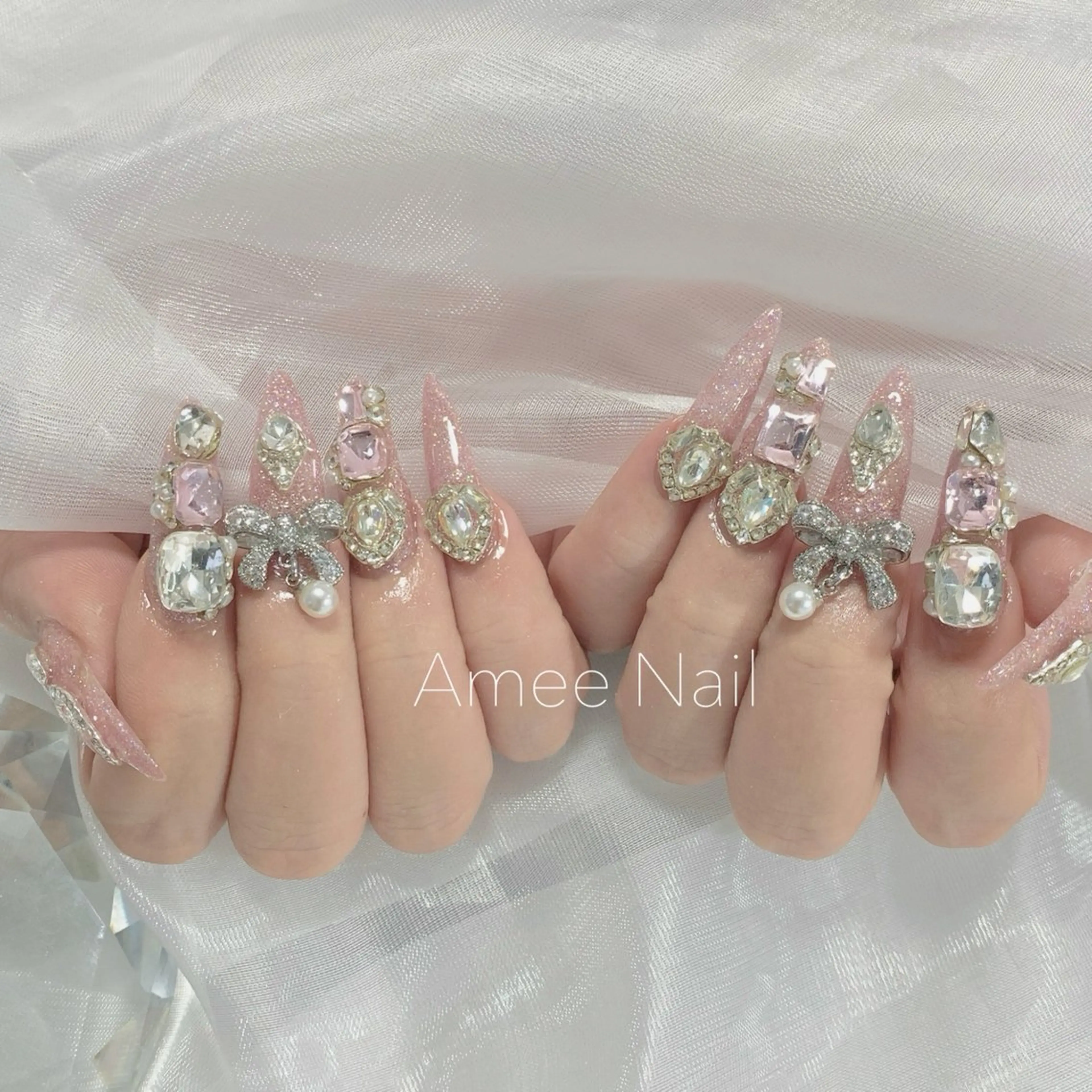 ネイル 成人式 ロングネイル マグネットネイル 大理石ネイル(マーブル) リボン ハンドネイル Amee Nailsalonのネイルデザイン