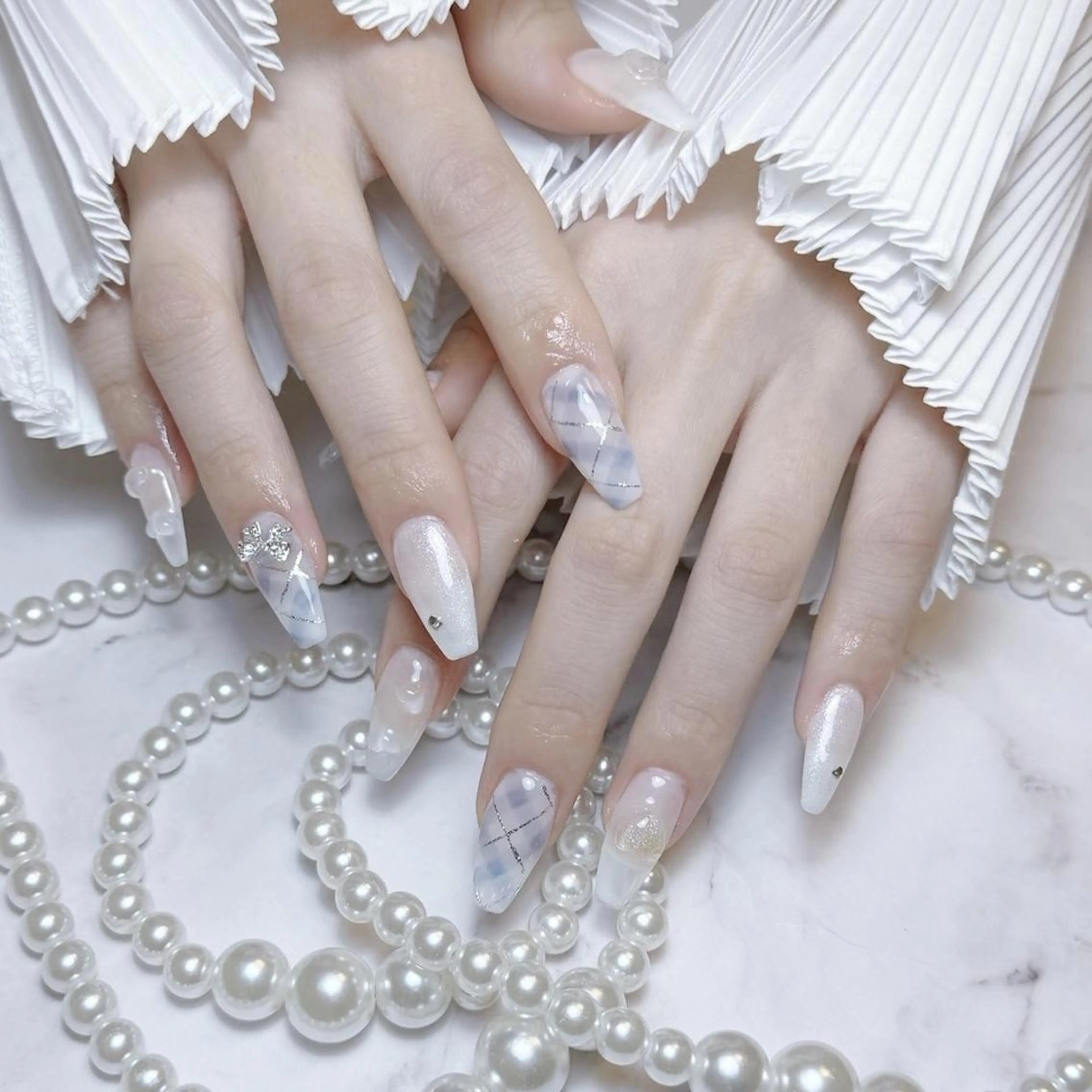 ネイル RAFFINE 月🦋🩵のネイルデザイン