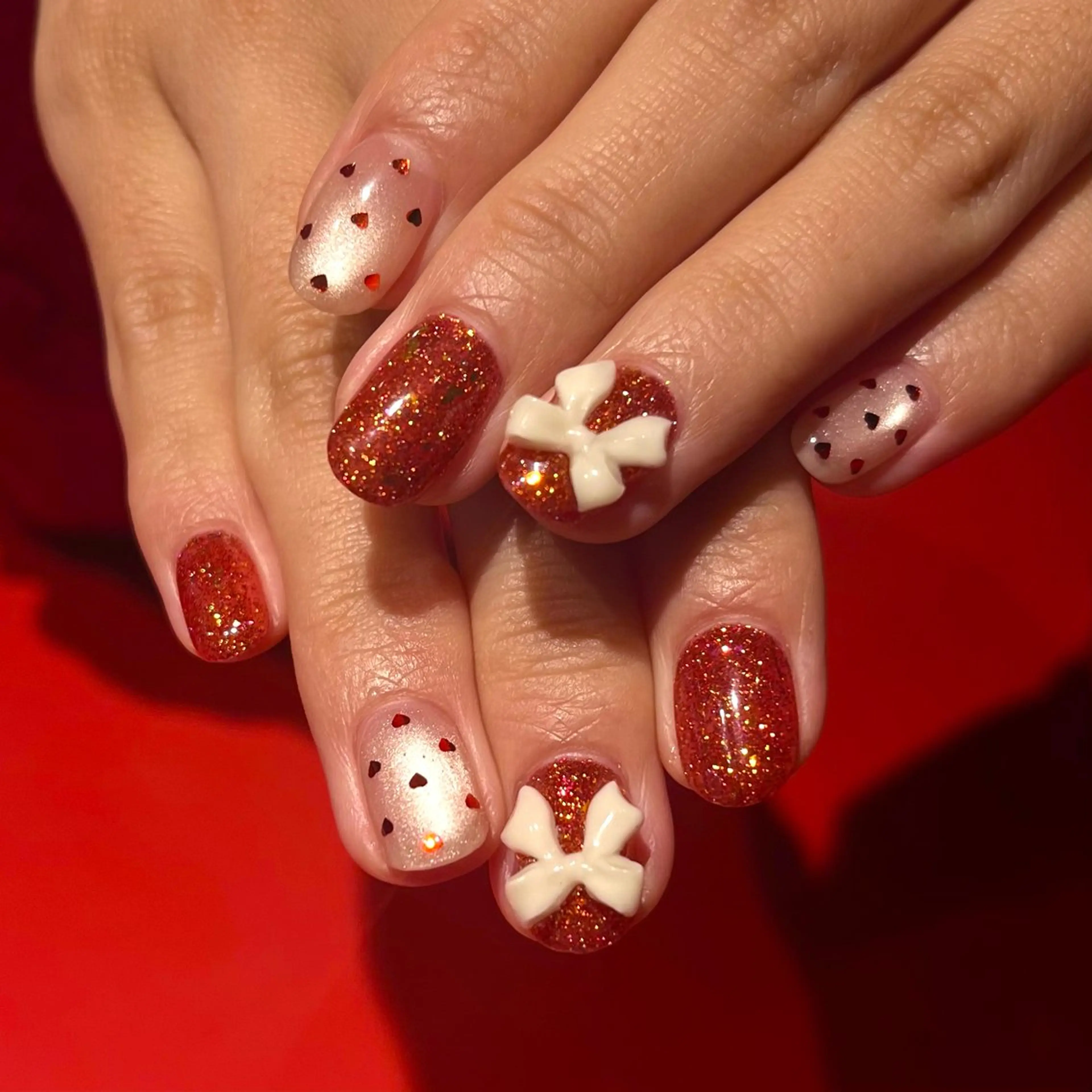 ネイル フラッシュネイル ガーリー ハート キラキラネイル ハンドネイル Belle studio所属・Belle studioのネイルデザイン