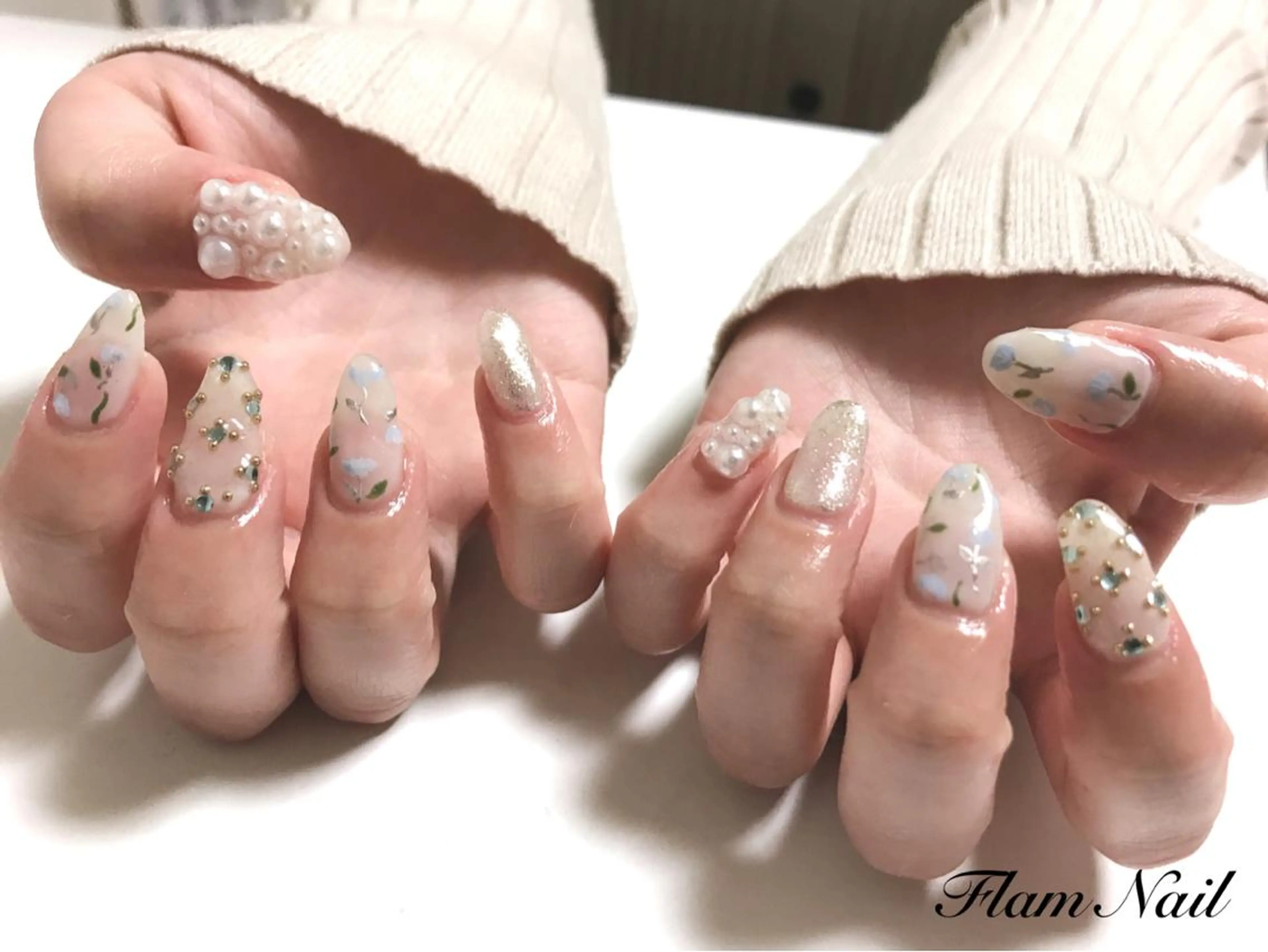 ネイル ブルー フラワーネイル 春ネイル Flam Nailのネイルデザイン