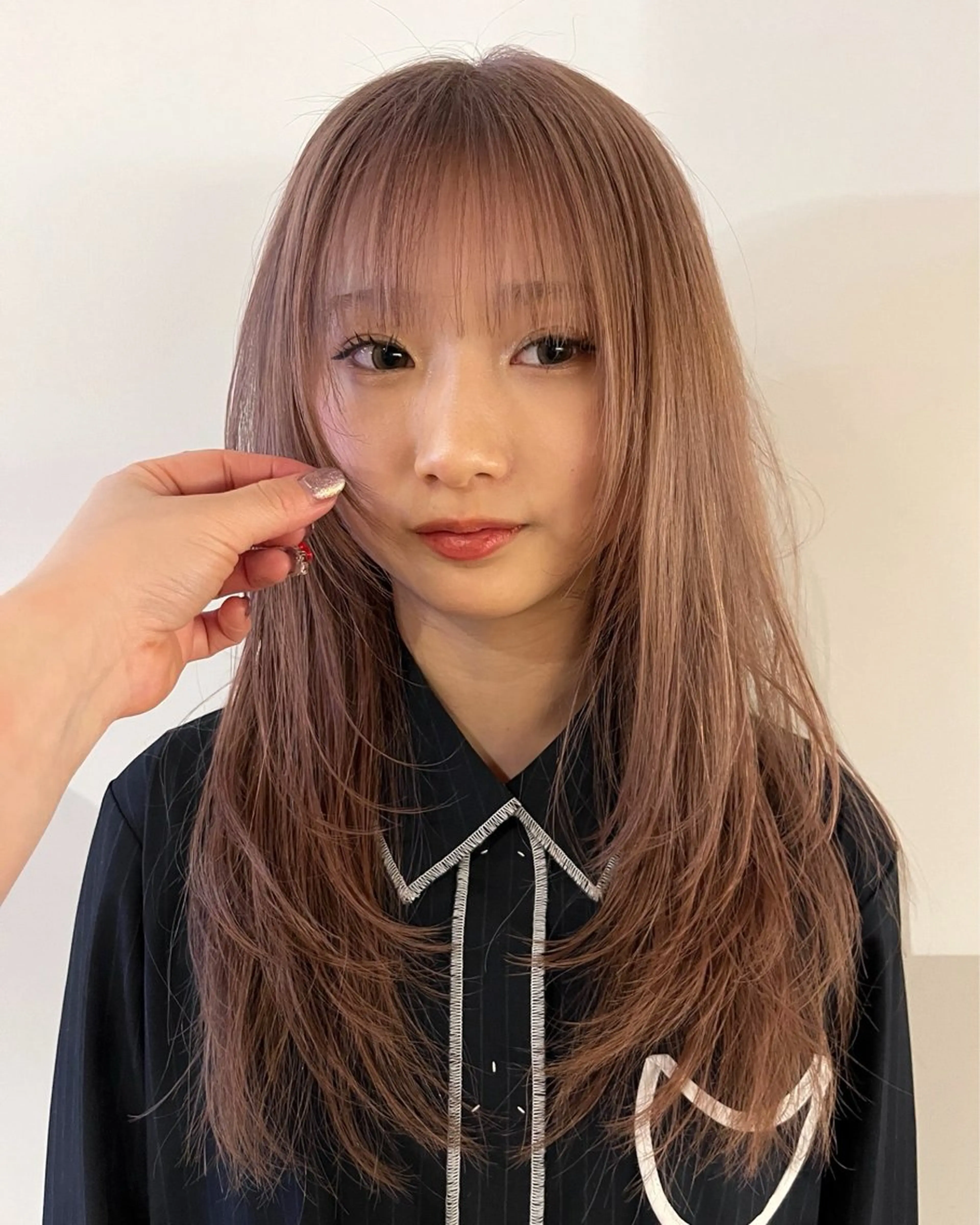 ロング ウシロダ メグミのヘアスタイル