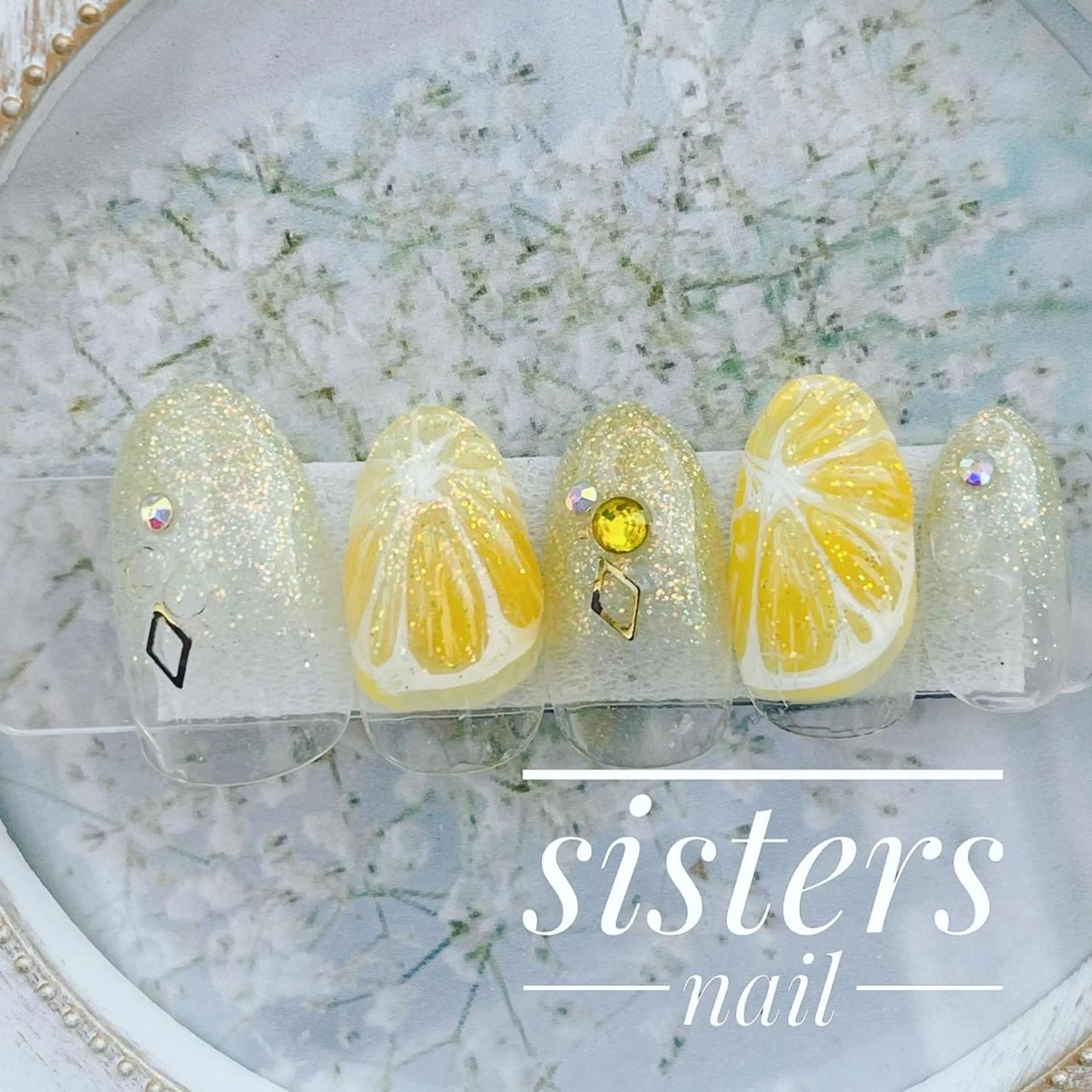 ネイル アートネイル キラキラネイル オレンジ ピンク 夏ネイル sisters nail.fのネイルデザイン